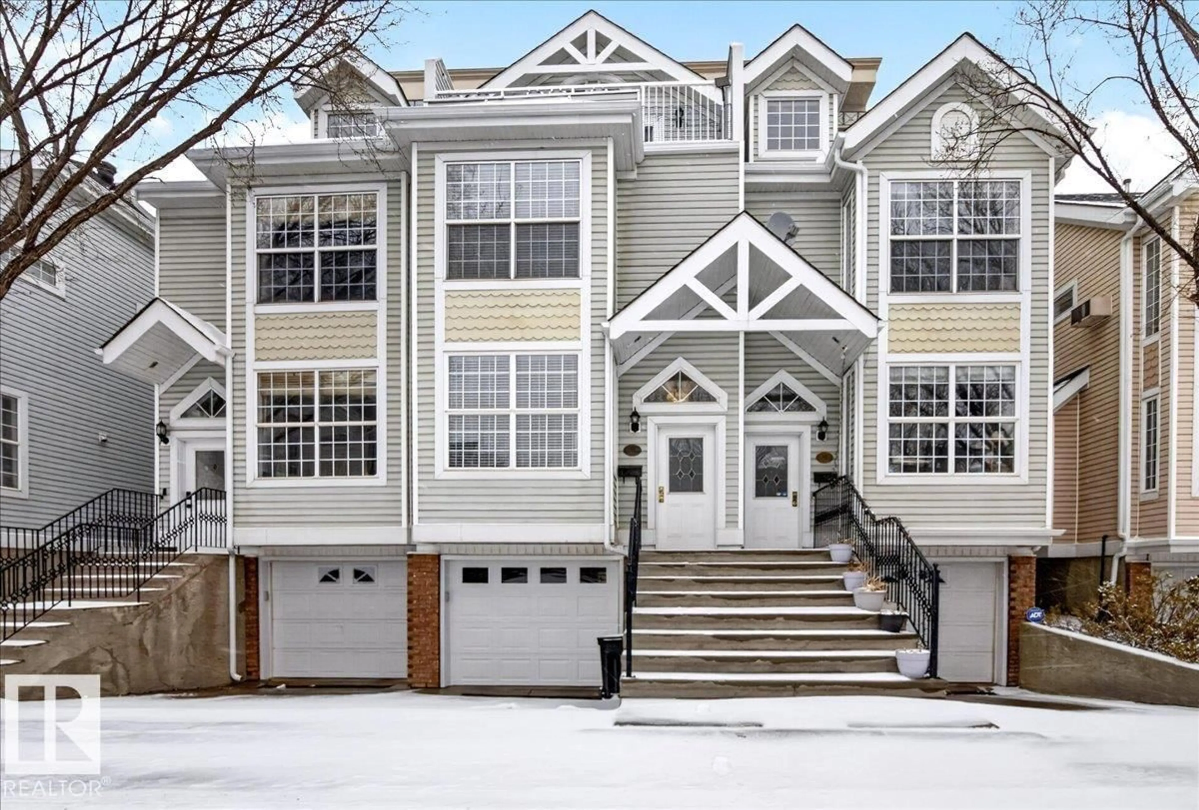 Home with vinyl exterior material, street for #34 - 10235 111 ST, Edmonton Alberta T5K2V5