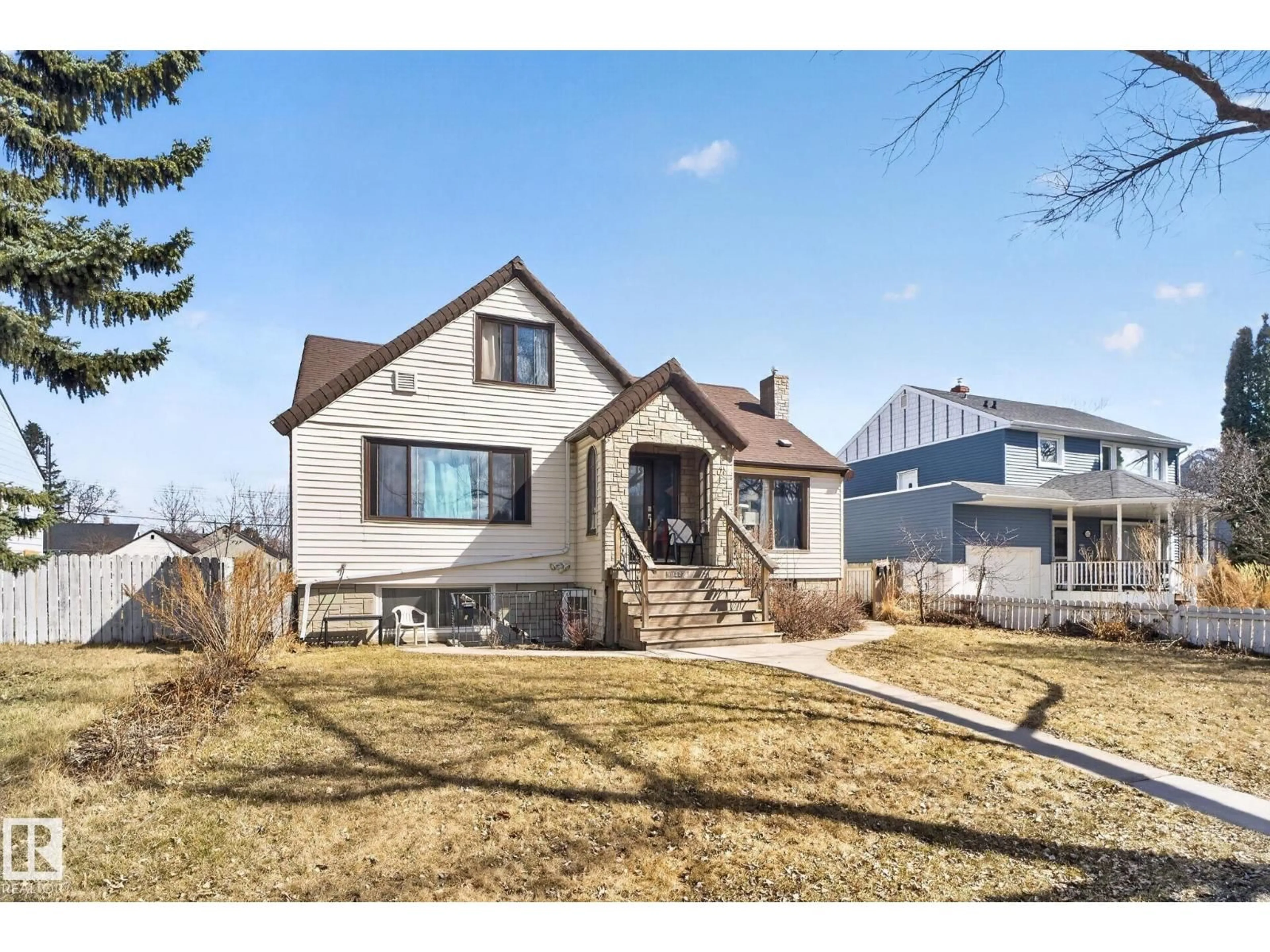 Home with brick exterior material, street for NW - 11227 103 ST, Edmonton Alberta T5G2H6