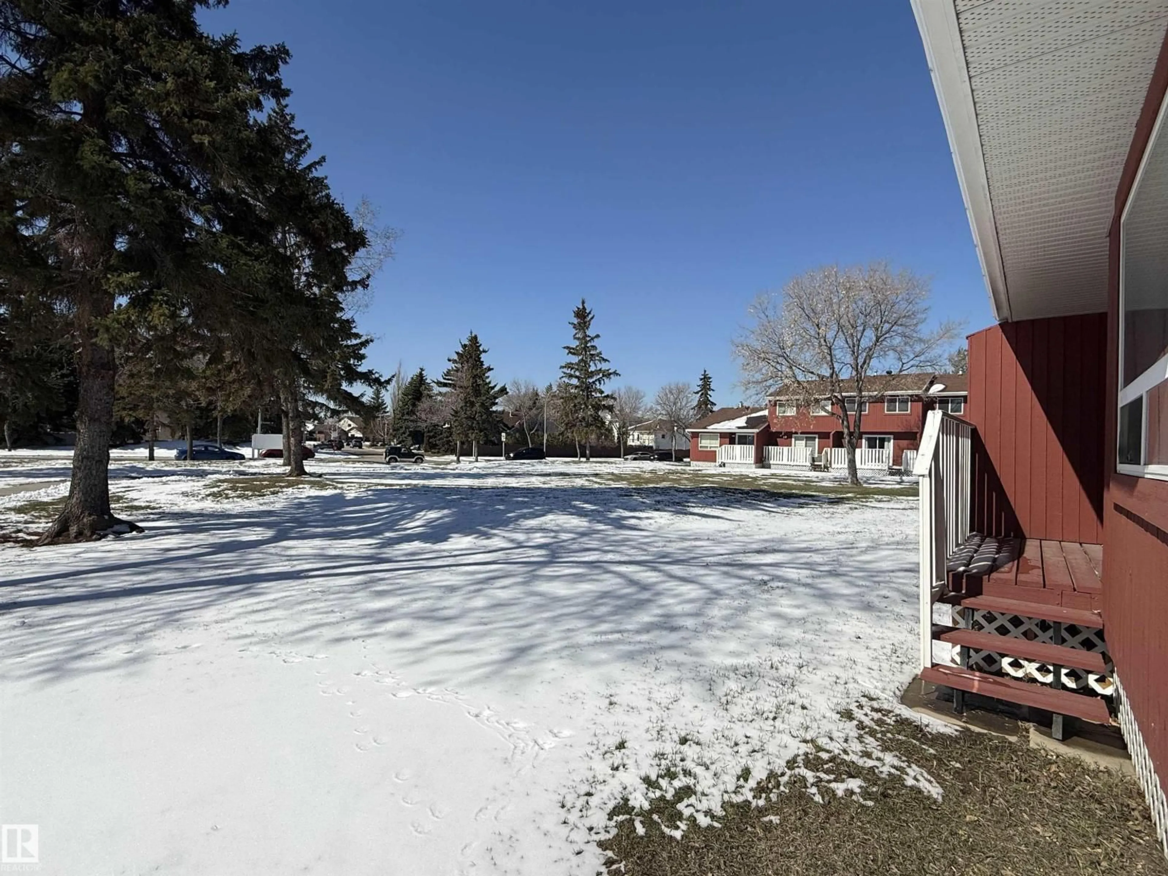 A pic from outside/outdoor area/front of a property/back of a property/a pic from drone, street for 10654 BEAUMARIS RD, Edmonton Alberta T5X3N4