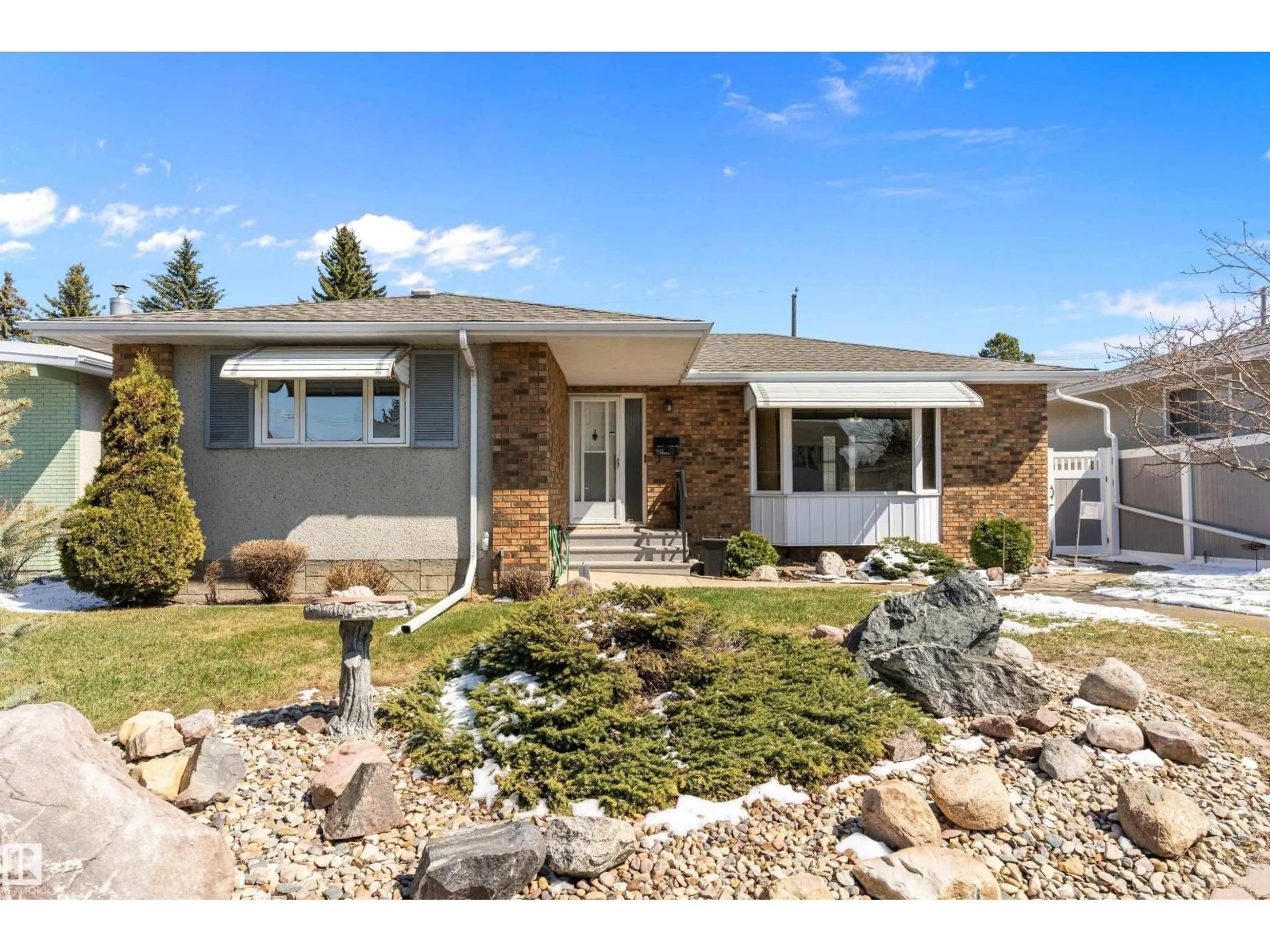Home with brick exterior material, street for NW - 9411 68A ST, Edmonton Alberta T6B1T9