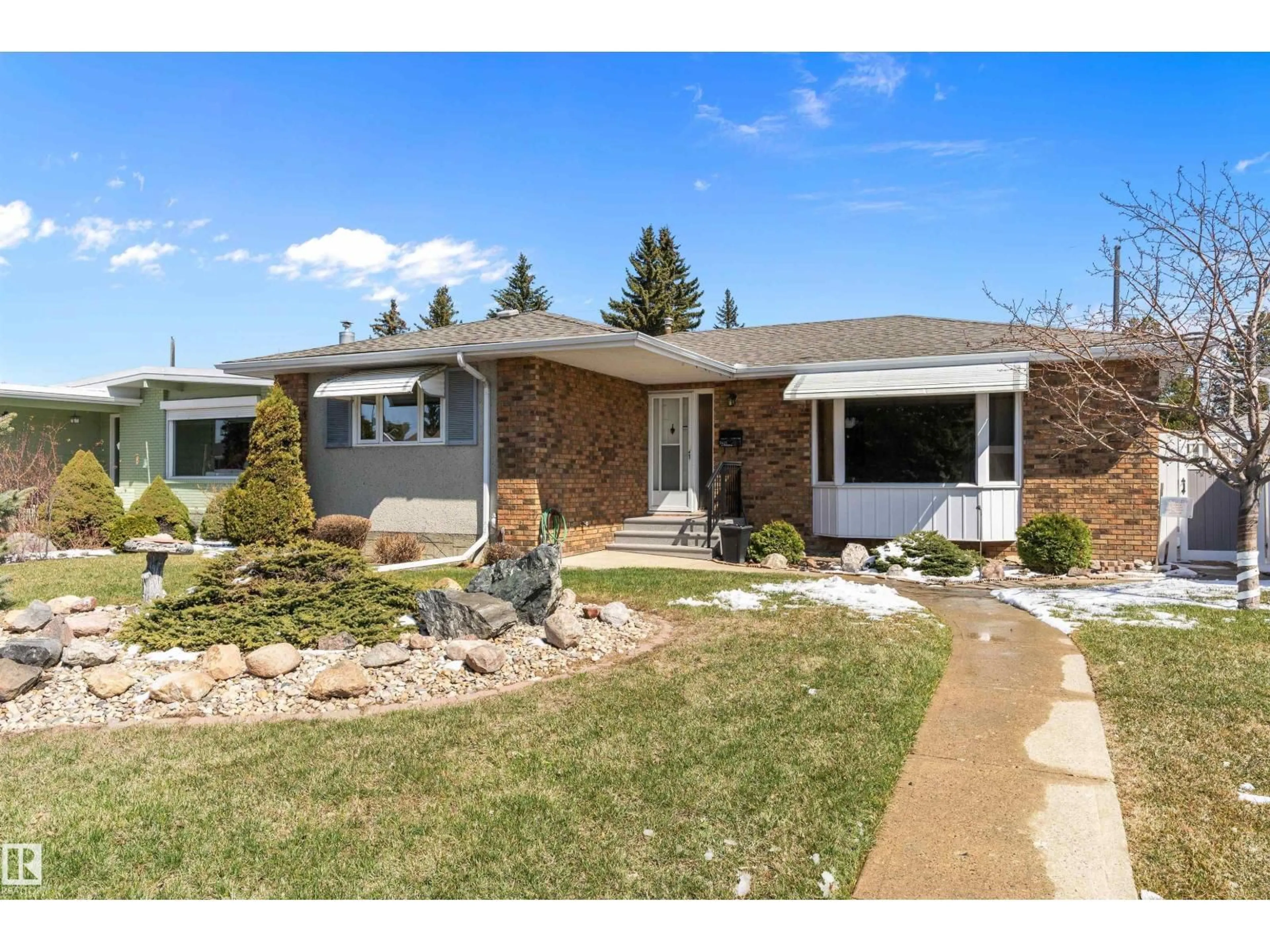 Home with vinyl exterior material, street for NW - 9411 68A ST, Edmonton Alberta T6B1T9