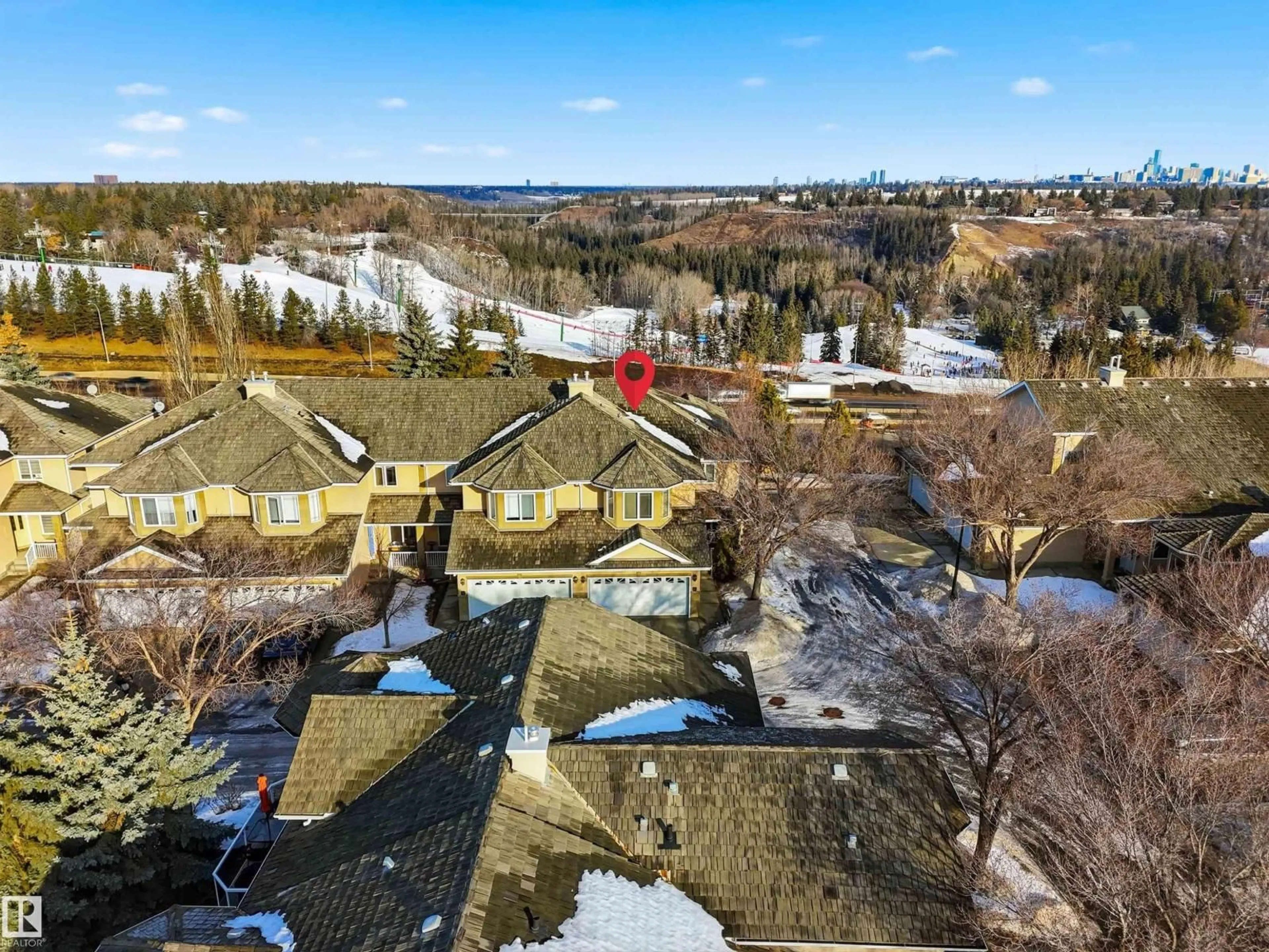 A pic from outside/outdoor area/front of a property/back of a property/a pic from drone, unknown for 12 - 577 BUTTERWORTH WY, Edmonton Alberta T6R2Y2