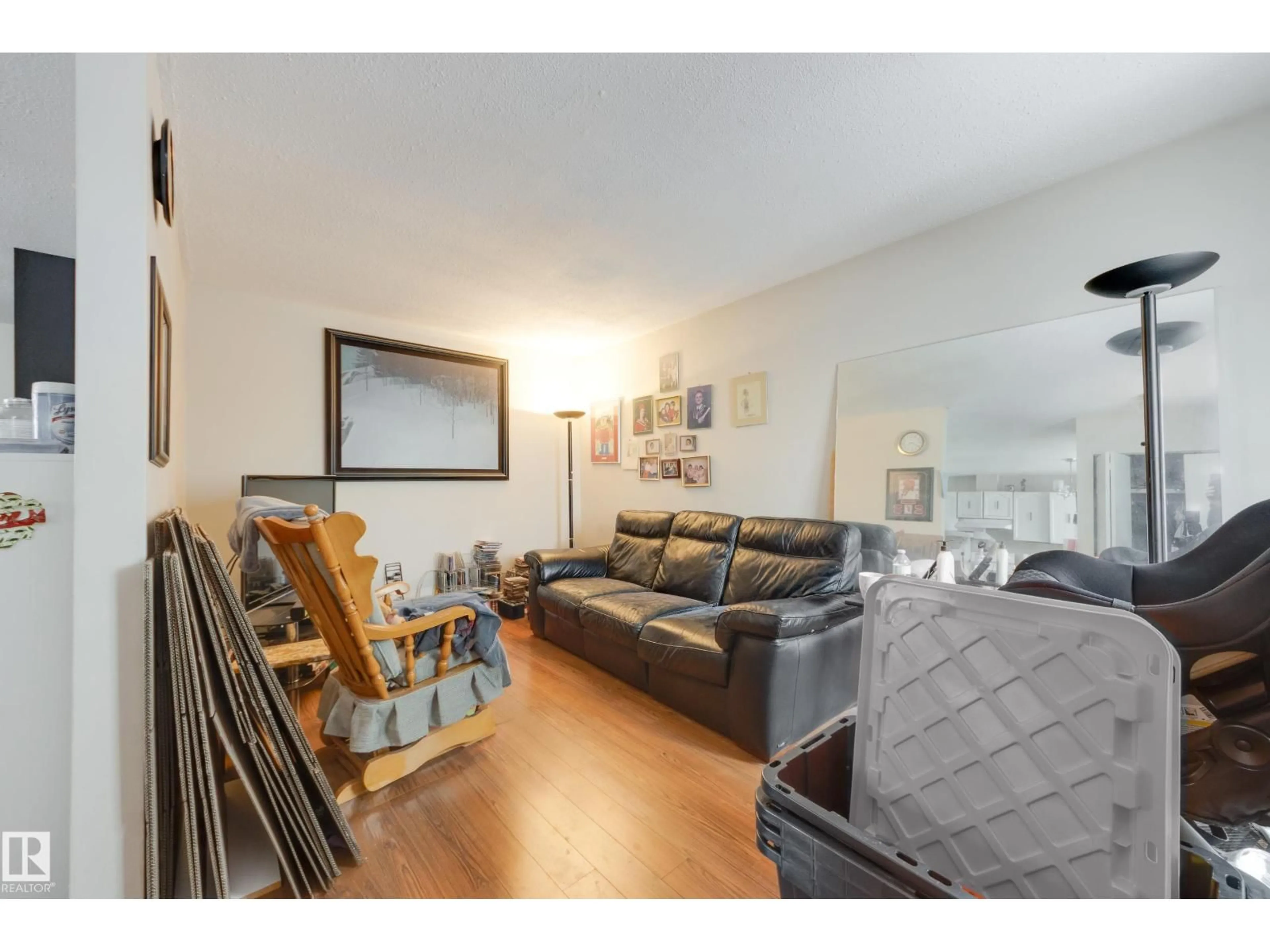 Living room with furniture, wood/laminate floor for 12775 116 ST, Edmonton Alberta T5E5H1