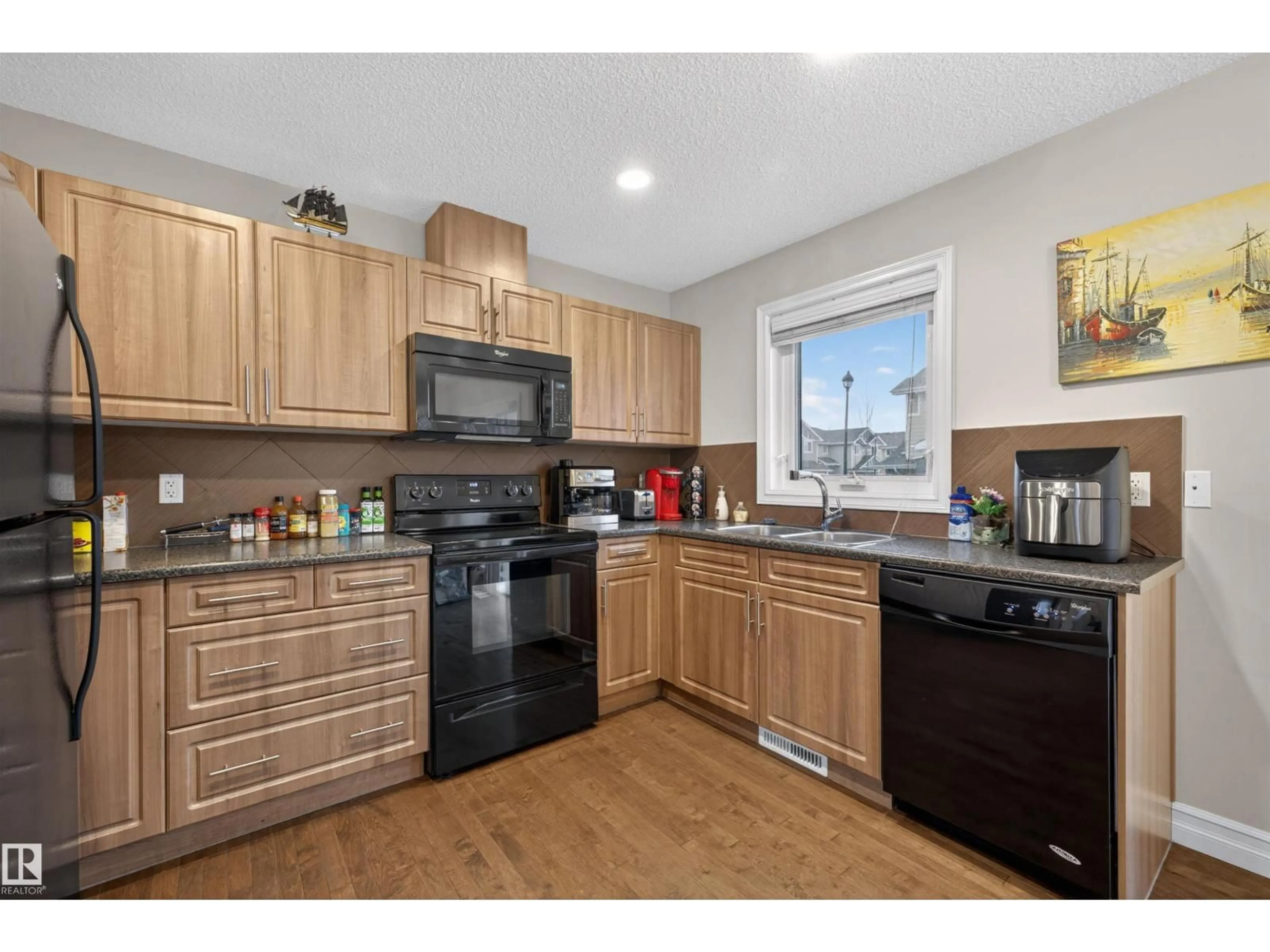 Standard kitchen, wood/laminate floor for 219 - 105 CHARLOTTE WY, Sherwood Park Alberta T8H0T3