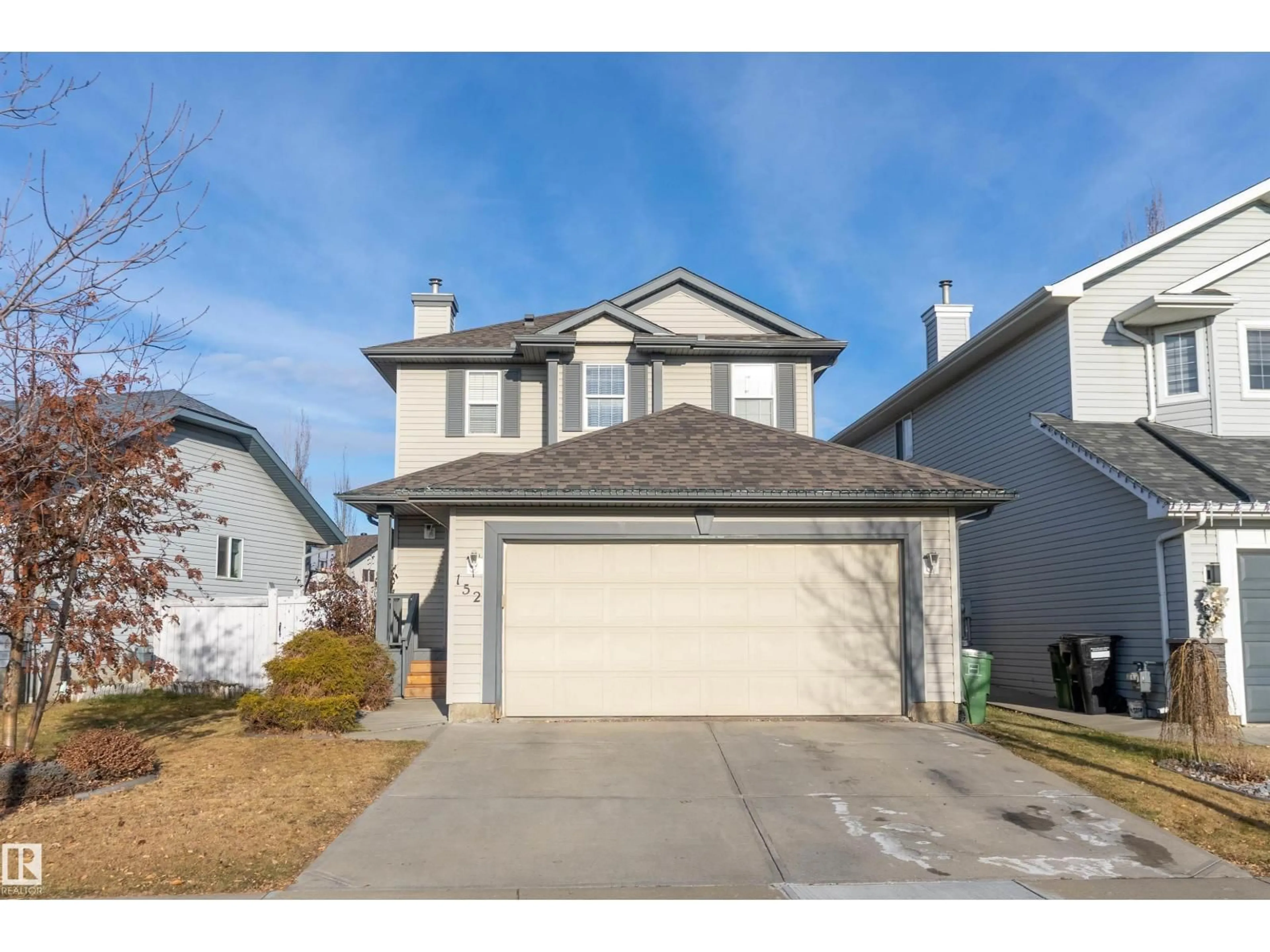 Home with vinyl exterior material, street for 152 EASTON RD, Edmonton Alberta T6X1C3