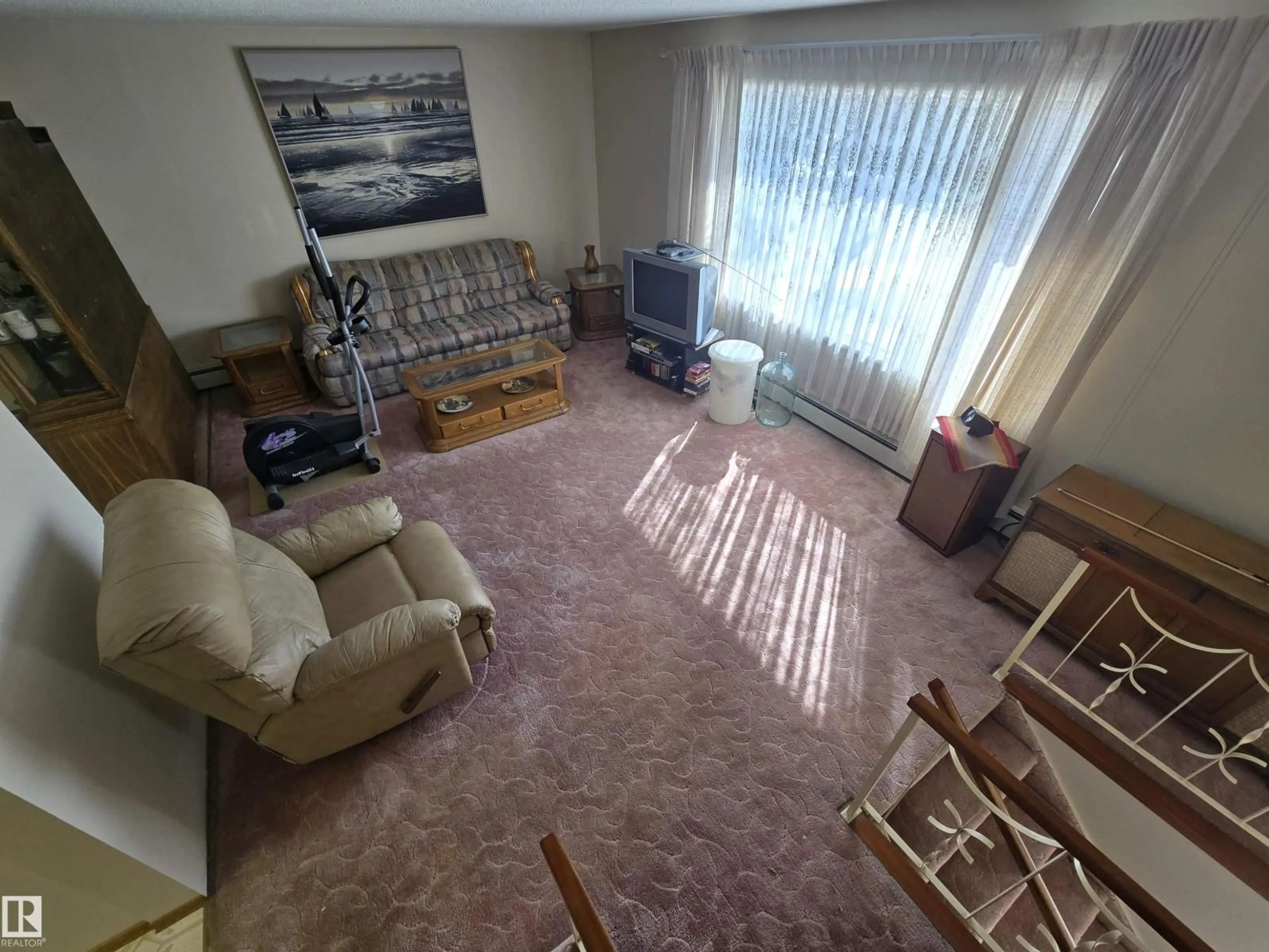 Living room with furniture, unknown for 3415 81 ST, Edmonton Alberta T6K0G3