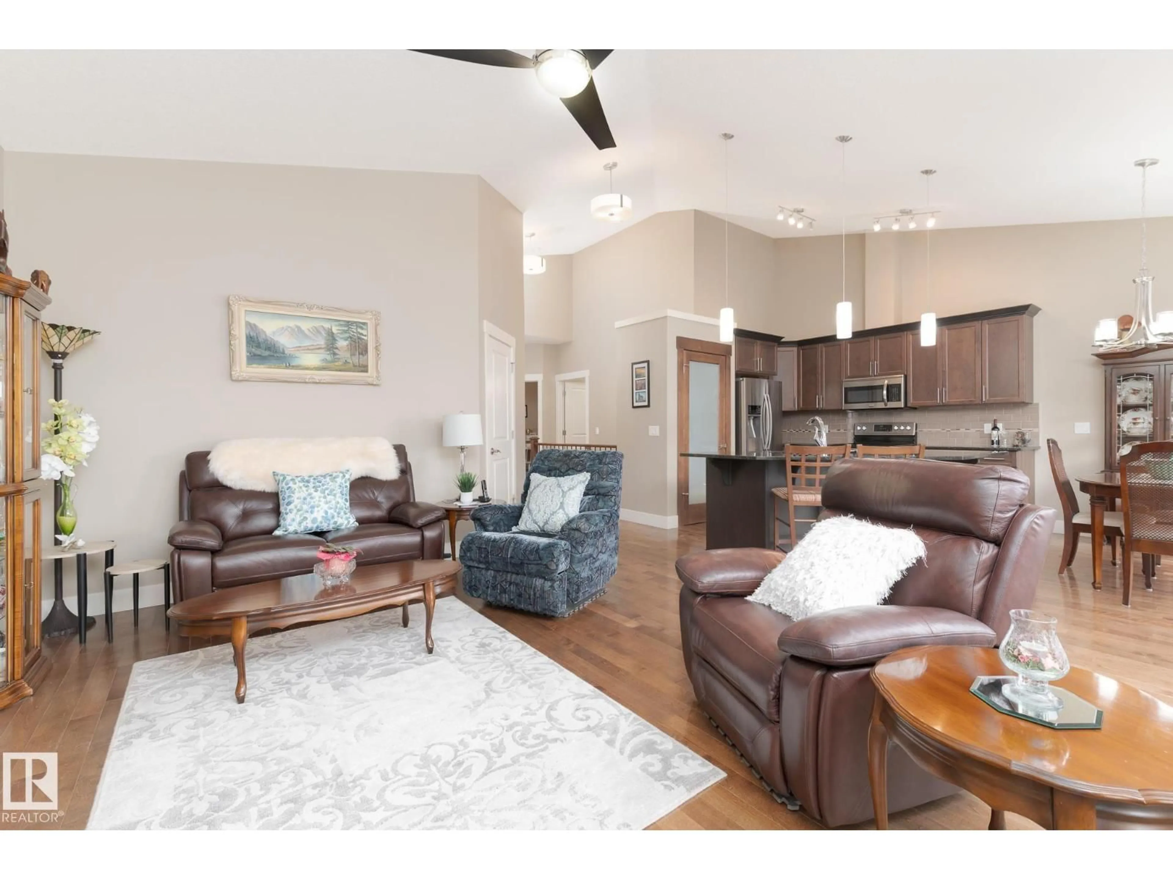 Living room with furniture, wood/laminate floor for 207 HEATHERGLEN DR, Spruce Grove Alberta T7X0R6