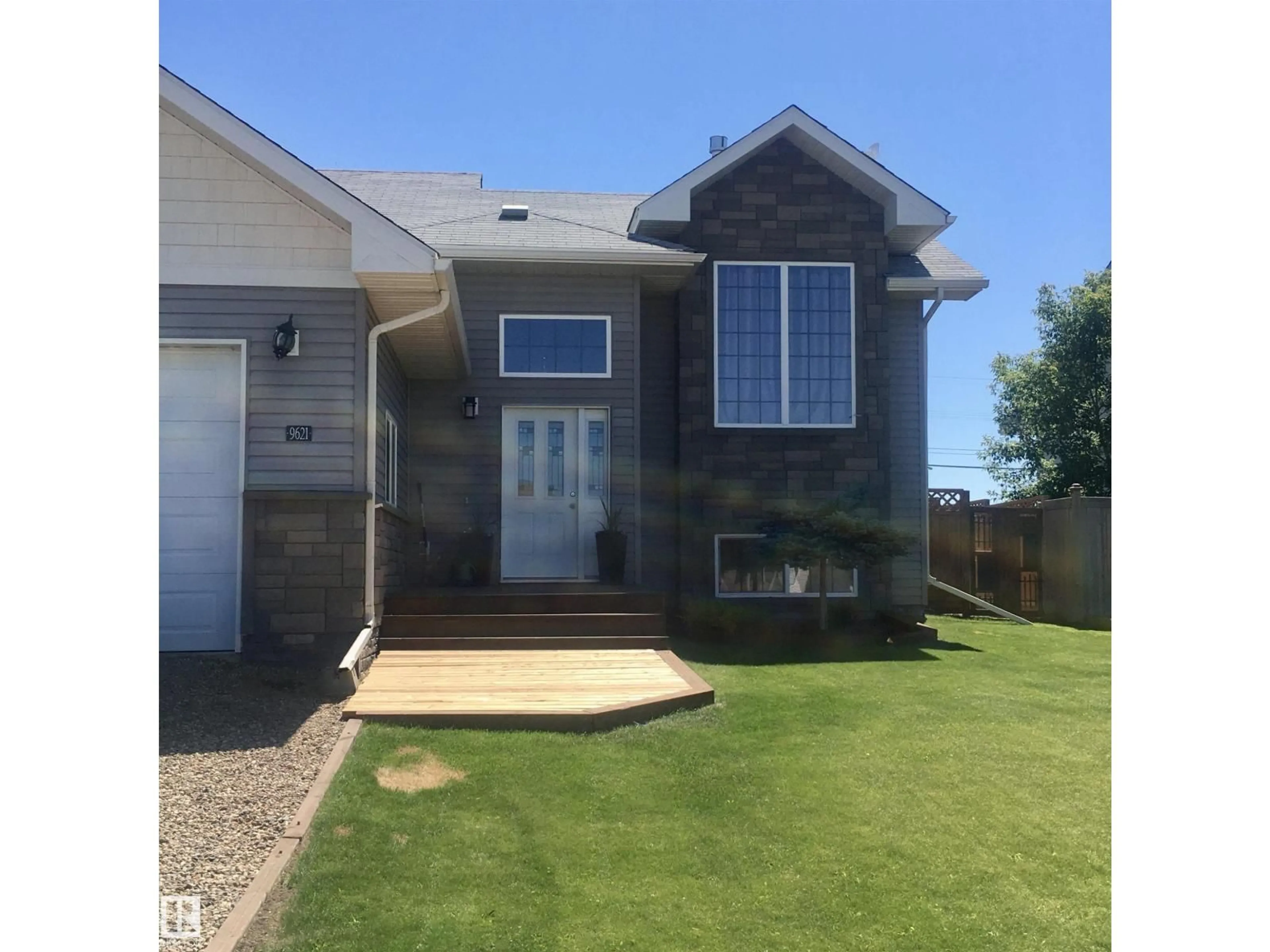 Home with vinyl exterior material, street for 9621 100 AVE, Lac La Biche Alberta T0A2C0