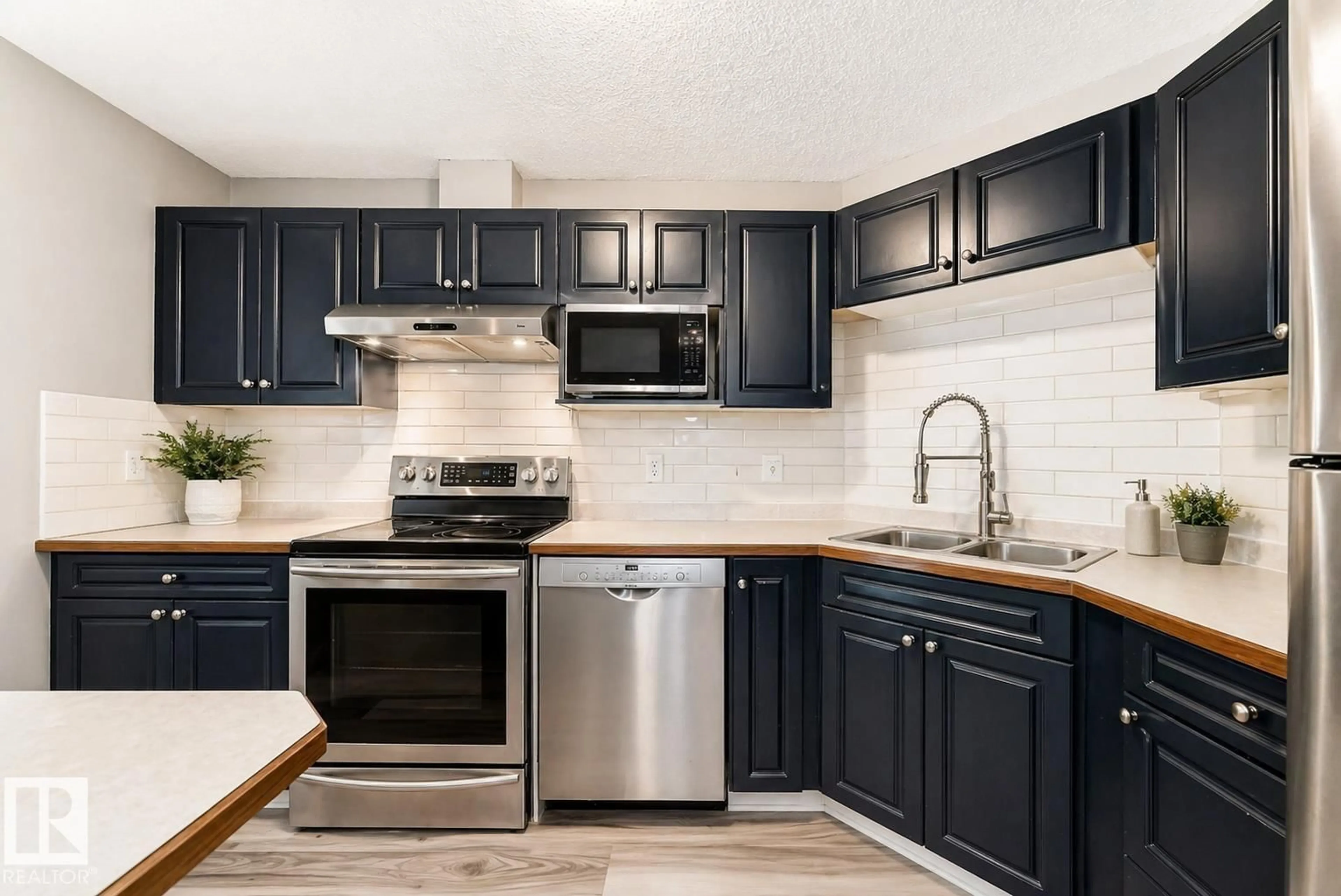 Open concept kitchen, ceramic/tile floor for #102 - 16221 95 ST, Edmonton Alberta T5Z3V3