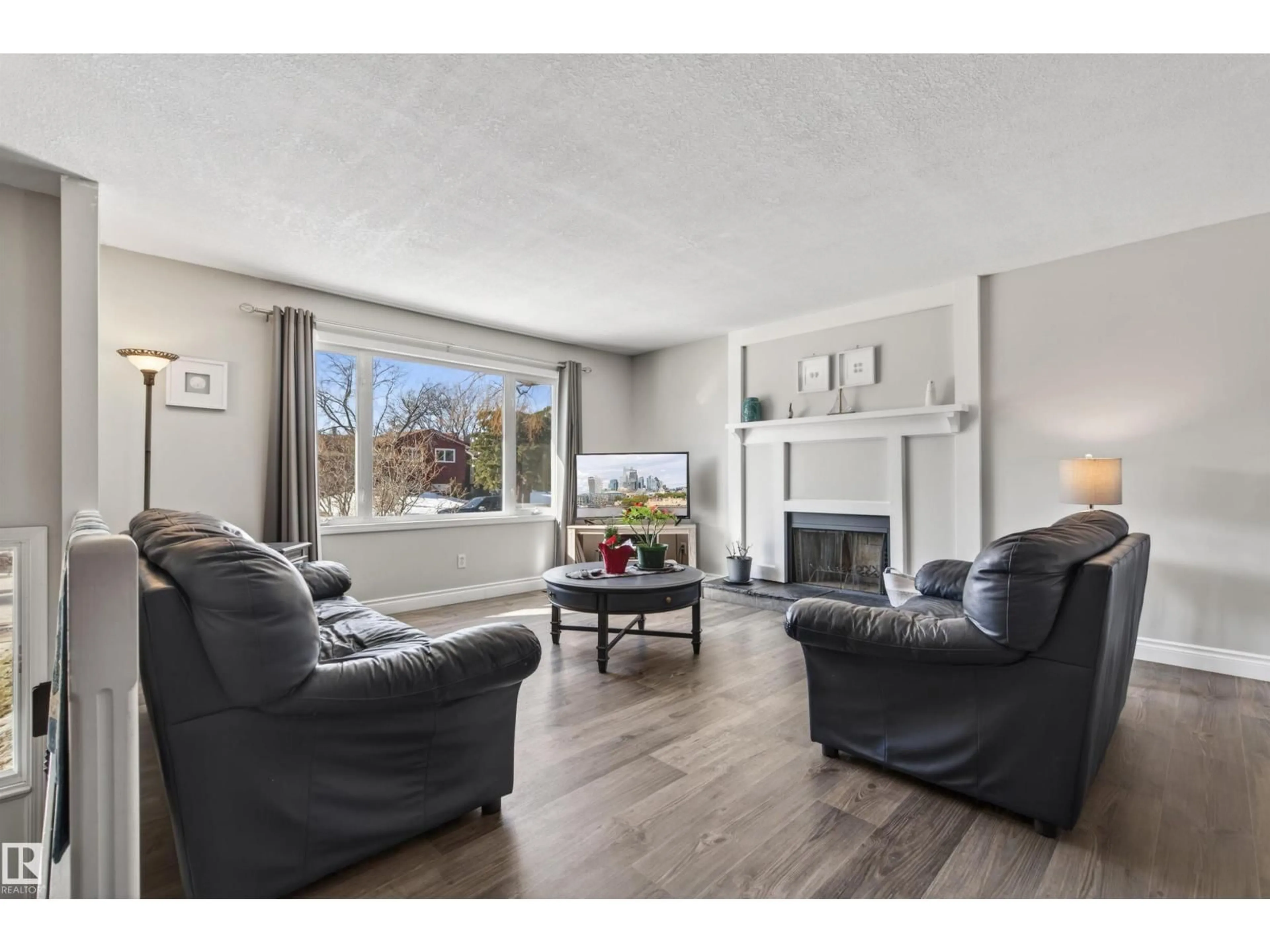 Living room with furniture, wood/laminate floor for 4 BRUYER CR, Cold Lake Alberta T9M1E2
