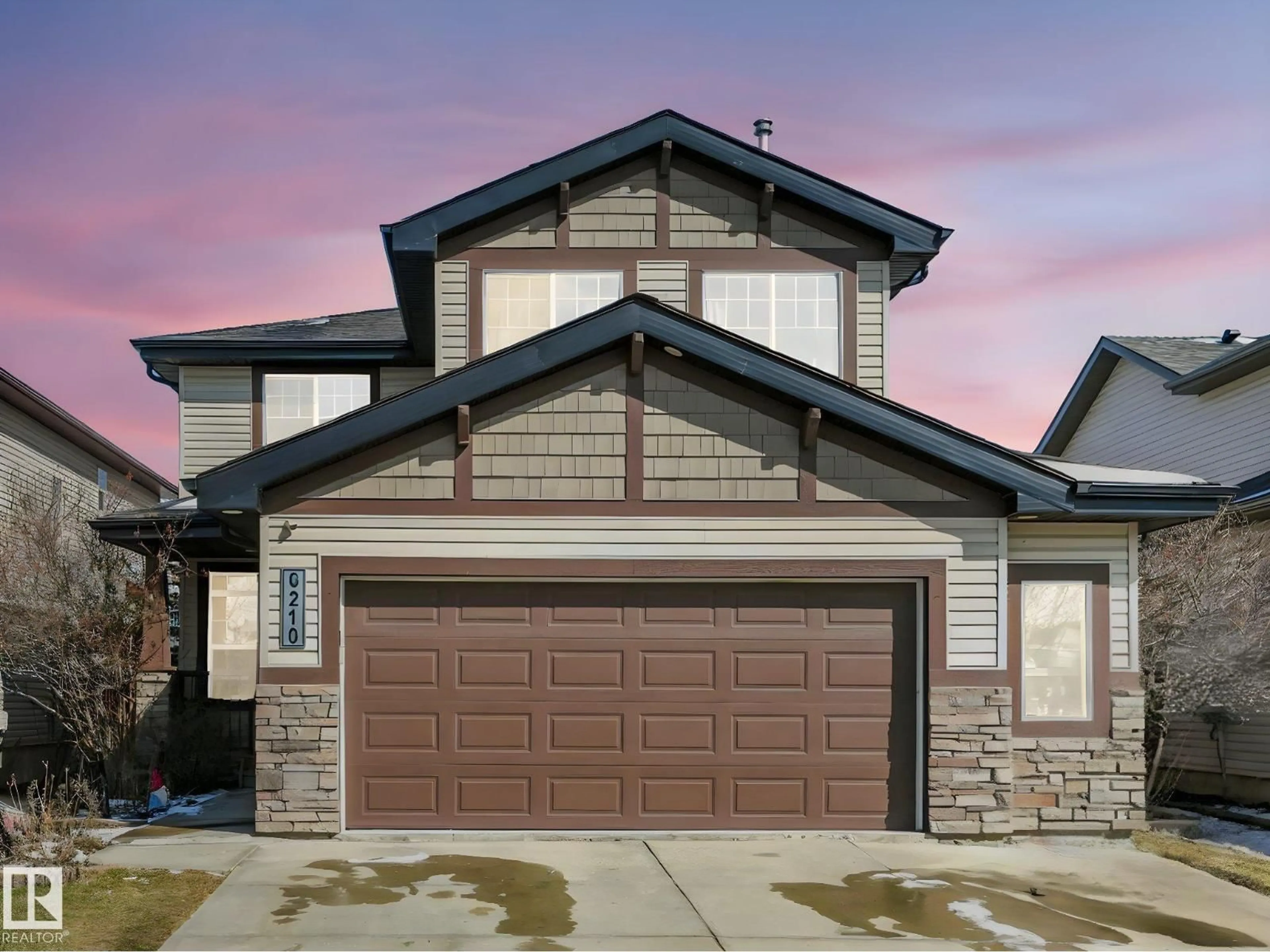 Home with vinyl exterior material, street for 6210 53 AV, Beaumont Alberta T4X1V4