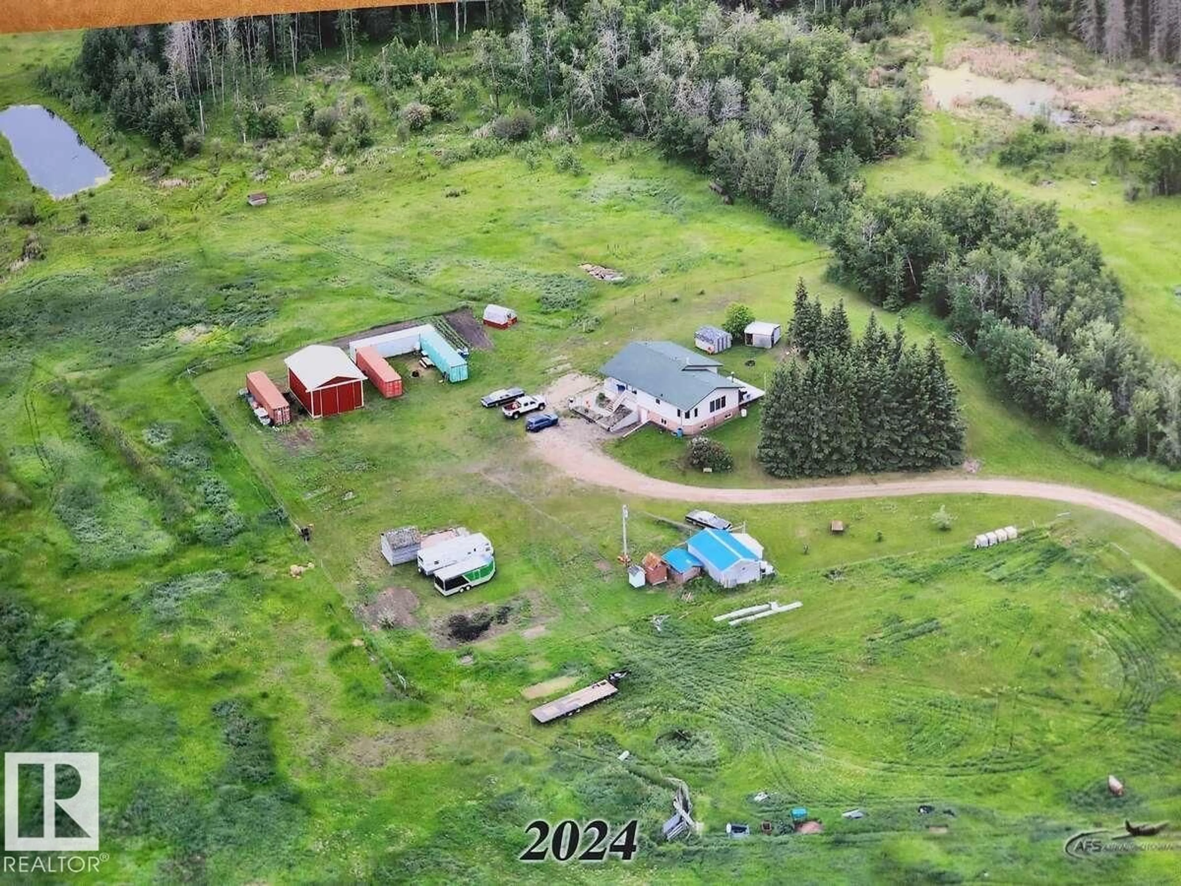 A pic from outside/outdoor area/front of a property/back of a property/a pic from drone, forest/trees view for 10315 TWP ROAD 612, Rural St. Paul County Alberta T0A2K0