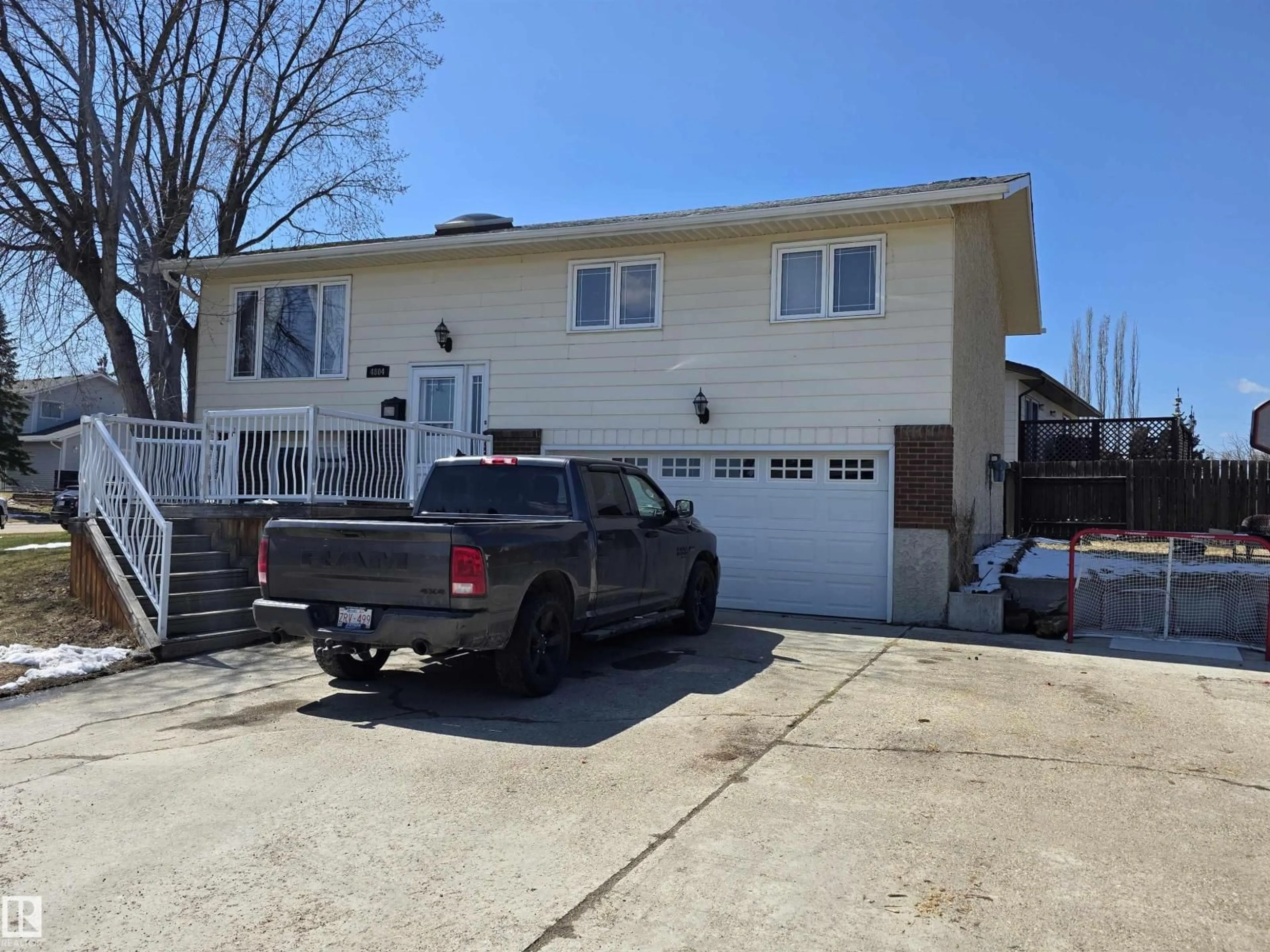 Home with vinyl exterior material, street for 4804 BECKETT RD, Drayton Valley Alberta T7A1C7