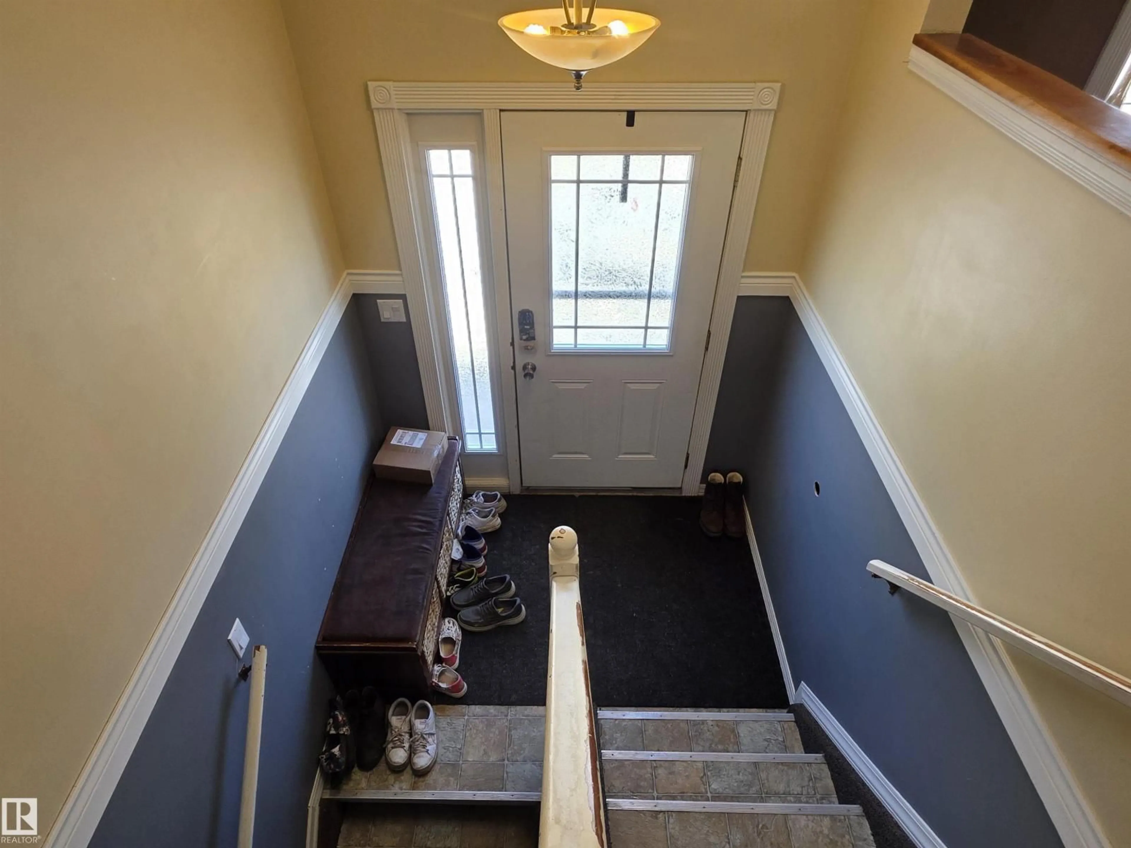 Indoor foyer for 4804 BECKETT RD, Drayton Valley Alberta T7A1C7