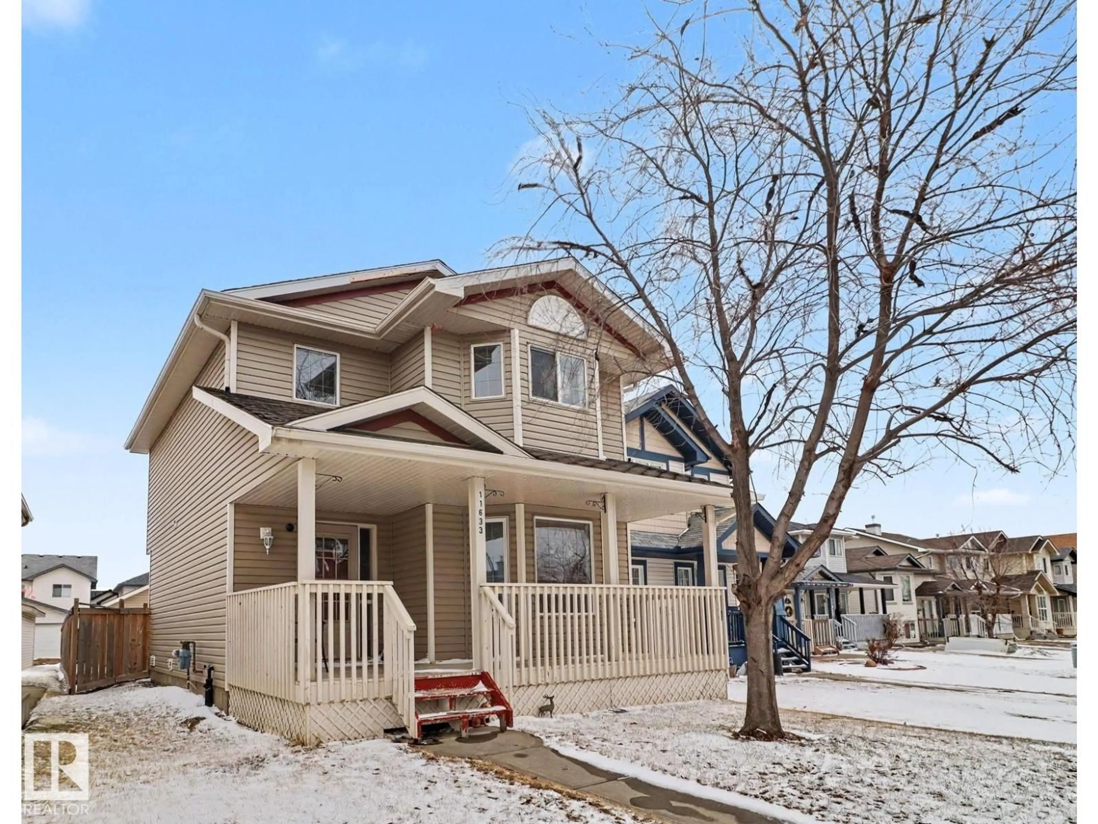 Home with vinyl exterior material, street for NW - 11633 167B AV, Edmonton Alberta T5X6K2