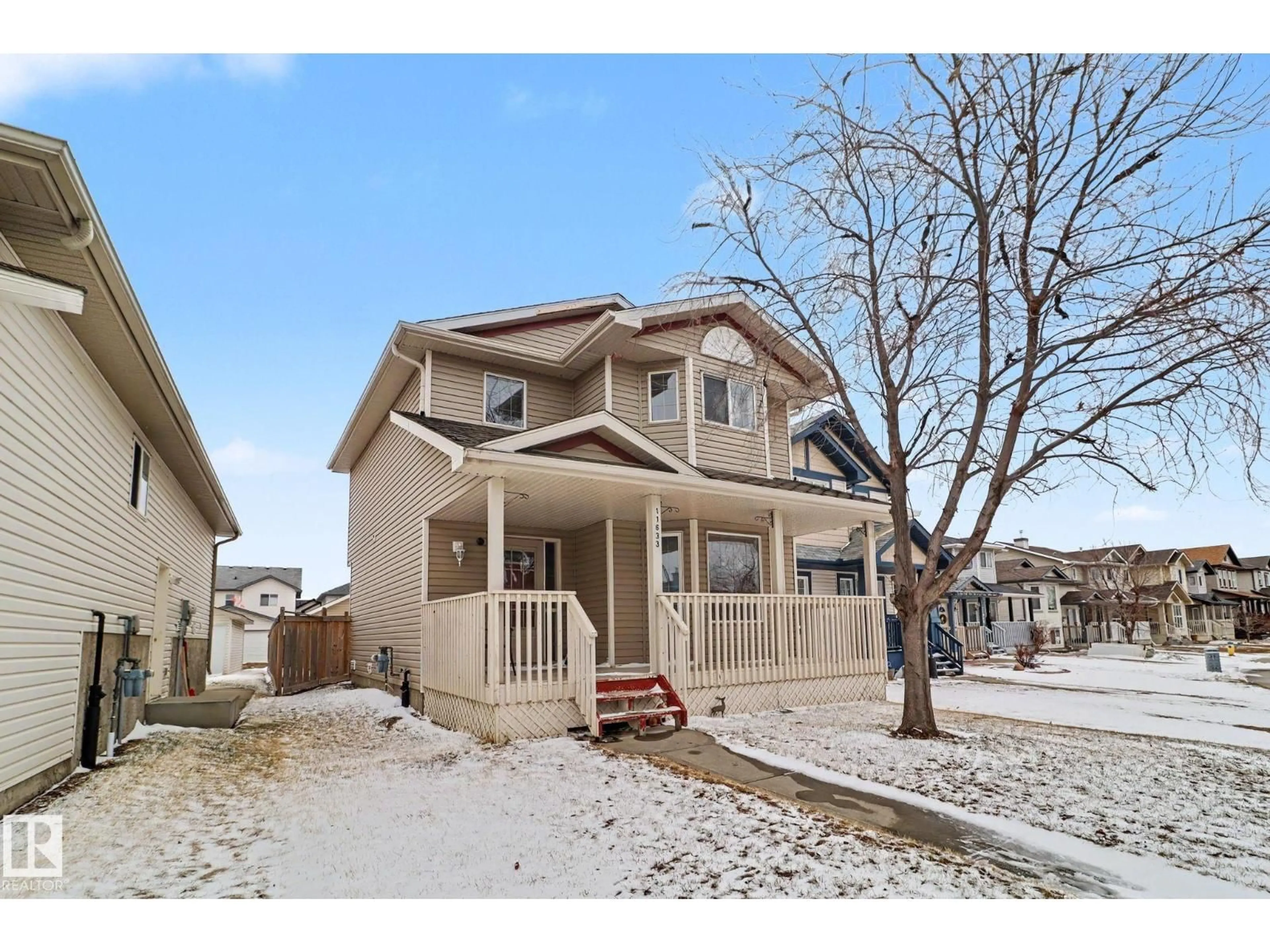 Home with vinyl exterior material, street for NW - 11633 167B AV, Edmonton Alberta T5X6K2