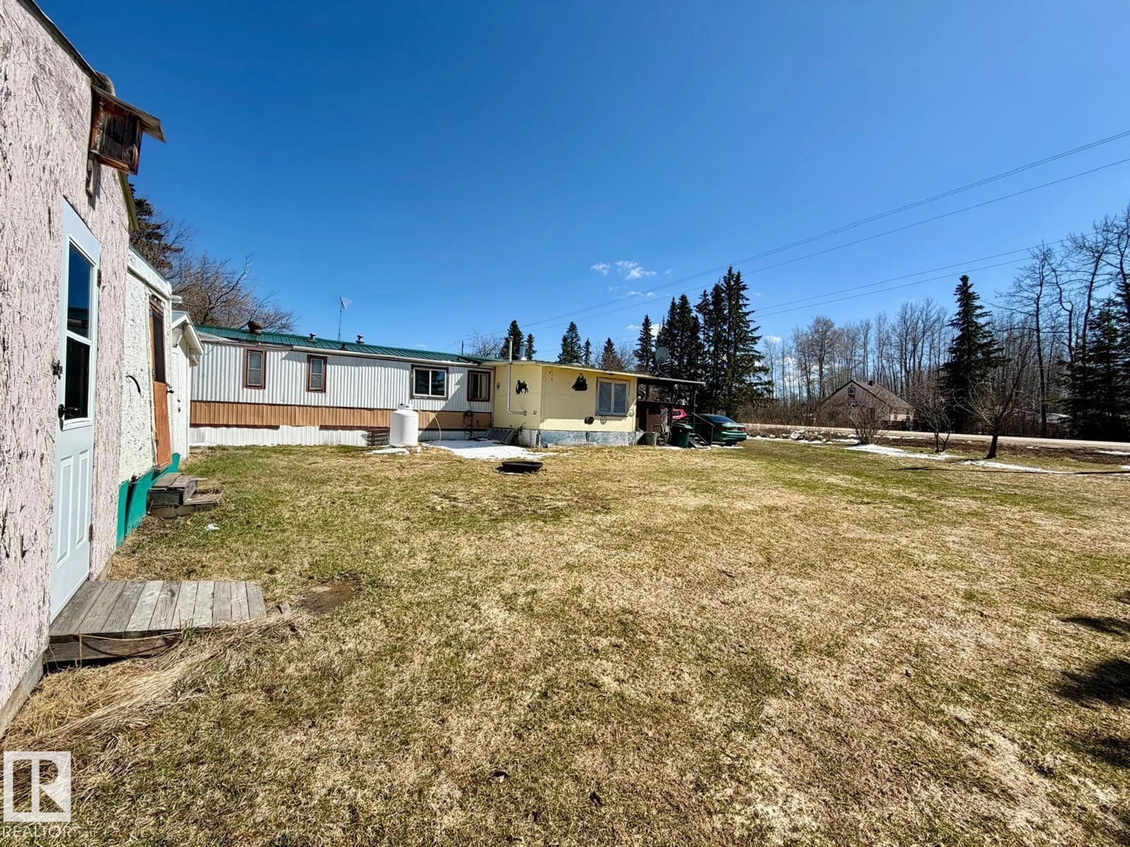 A pic from outside/outdoor area/front of a property/back of a property/a pic from drone, unknown for 306 HWY 13 W, Alder Flats Alberta T0C0A0