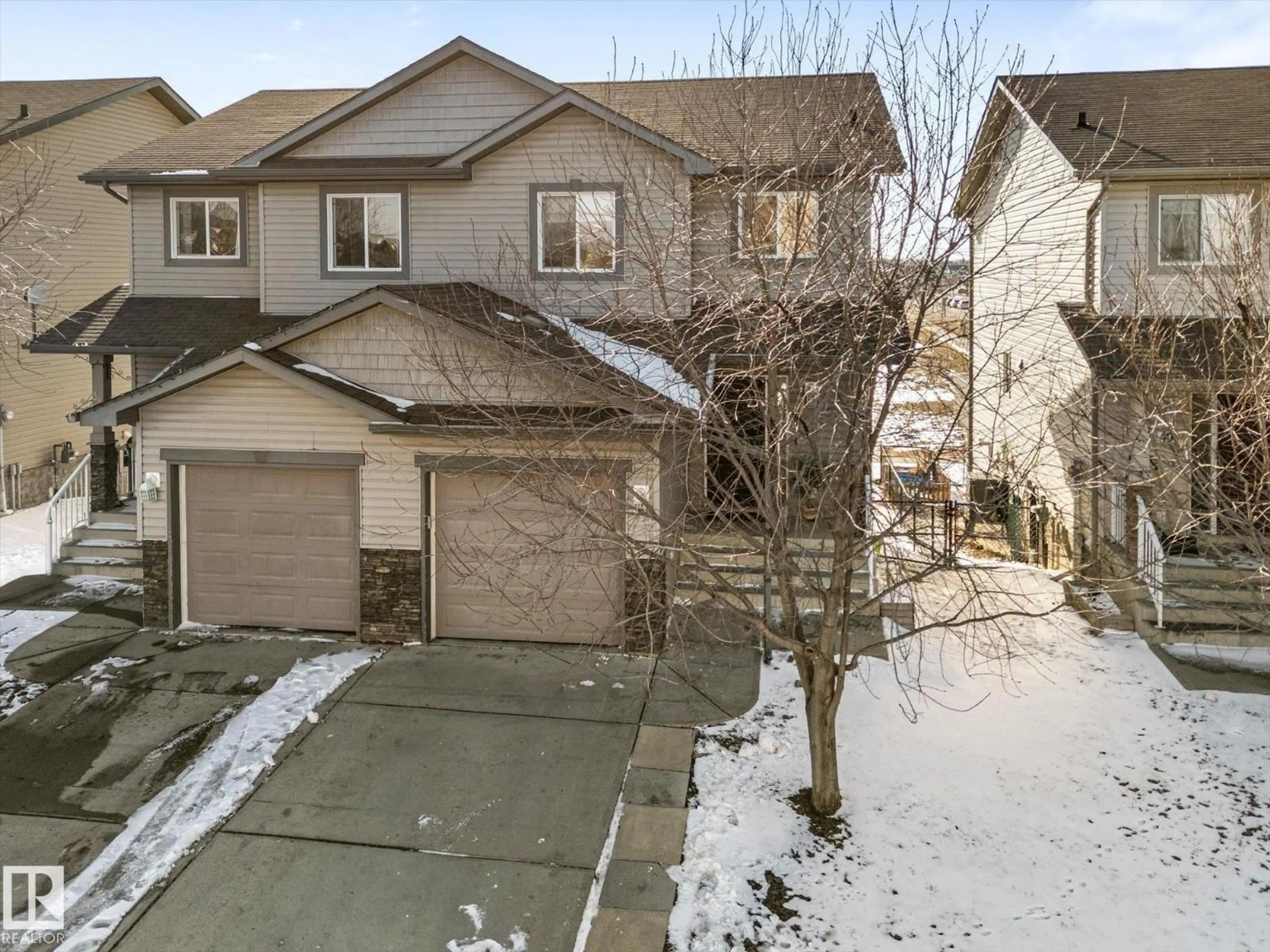 A pic from outside/outdoor area/front of a property/back of a property/a pic from drone, street for 39 85 SPRUCE VILLAGE DR, Spruce Grove Alberta T7X0L2