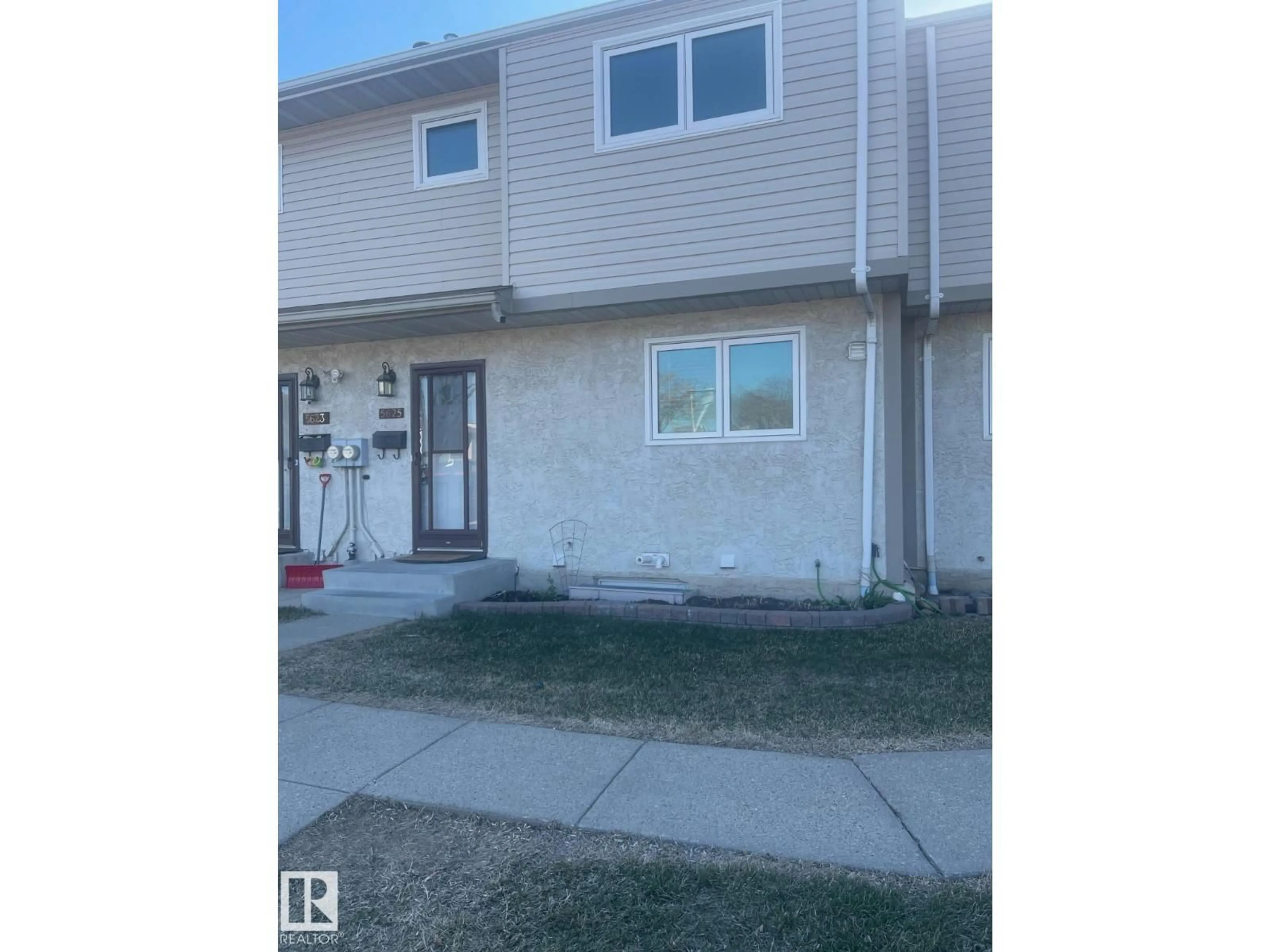 Home with vinyl exterior material, street for 5625 137 AV, Edmonton Alberta T5A2H4