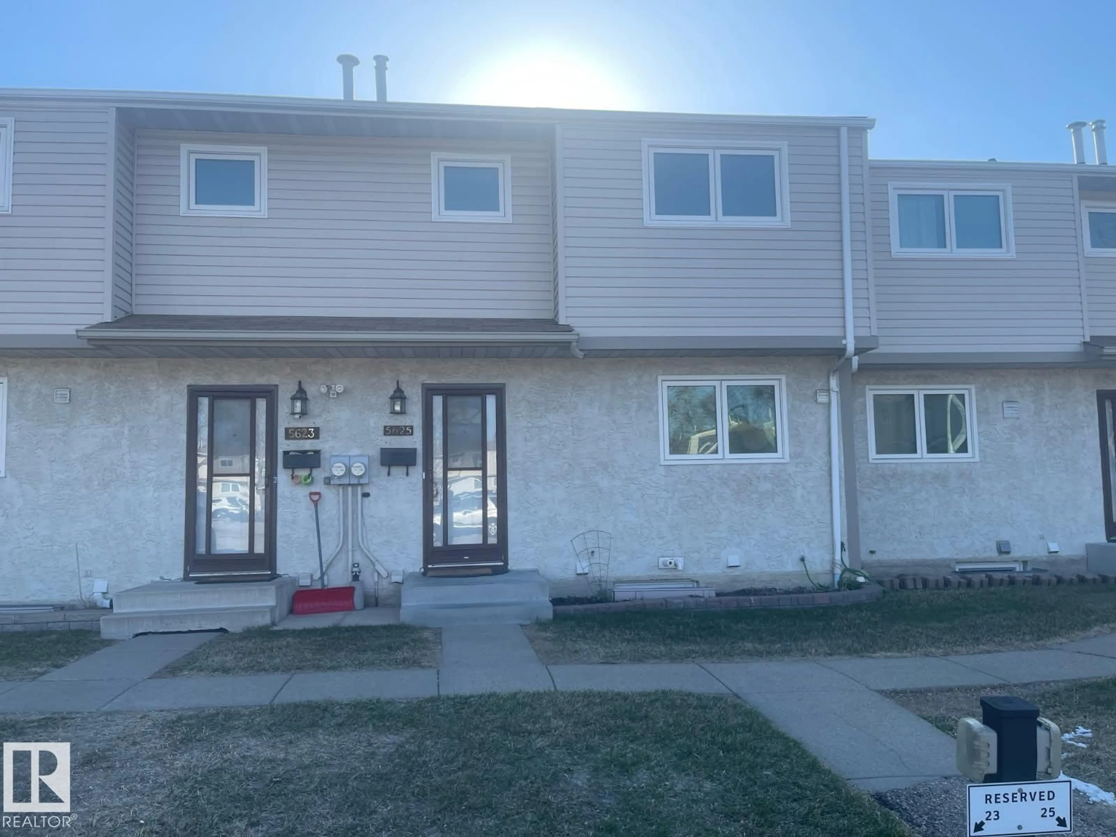 Home with vinyl exterior material, street for 5625 137 AV, Edmonton Alberta T5A2H4