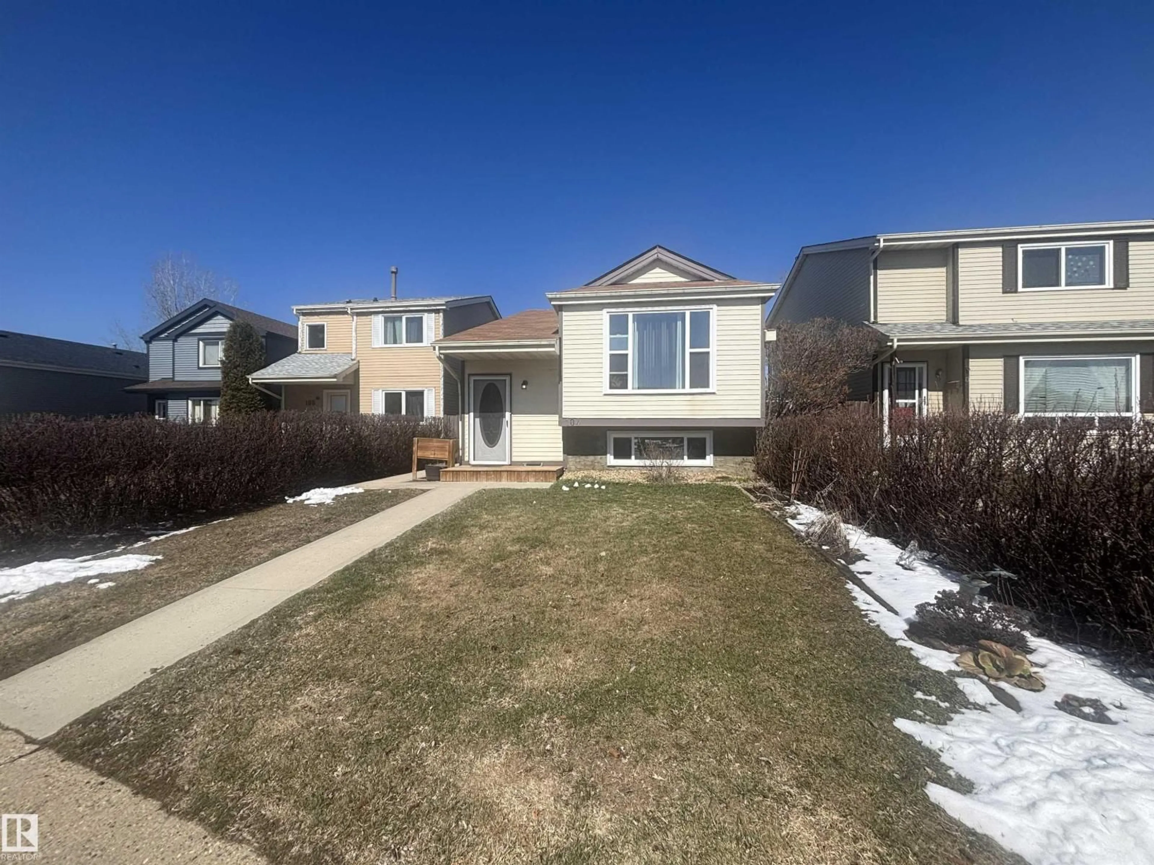 Home with vinyl exterior material, street for 104 BIRCH DR, Gibbons Alberta T0A1N0