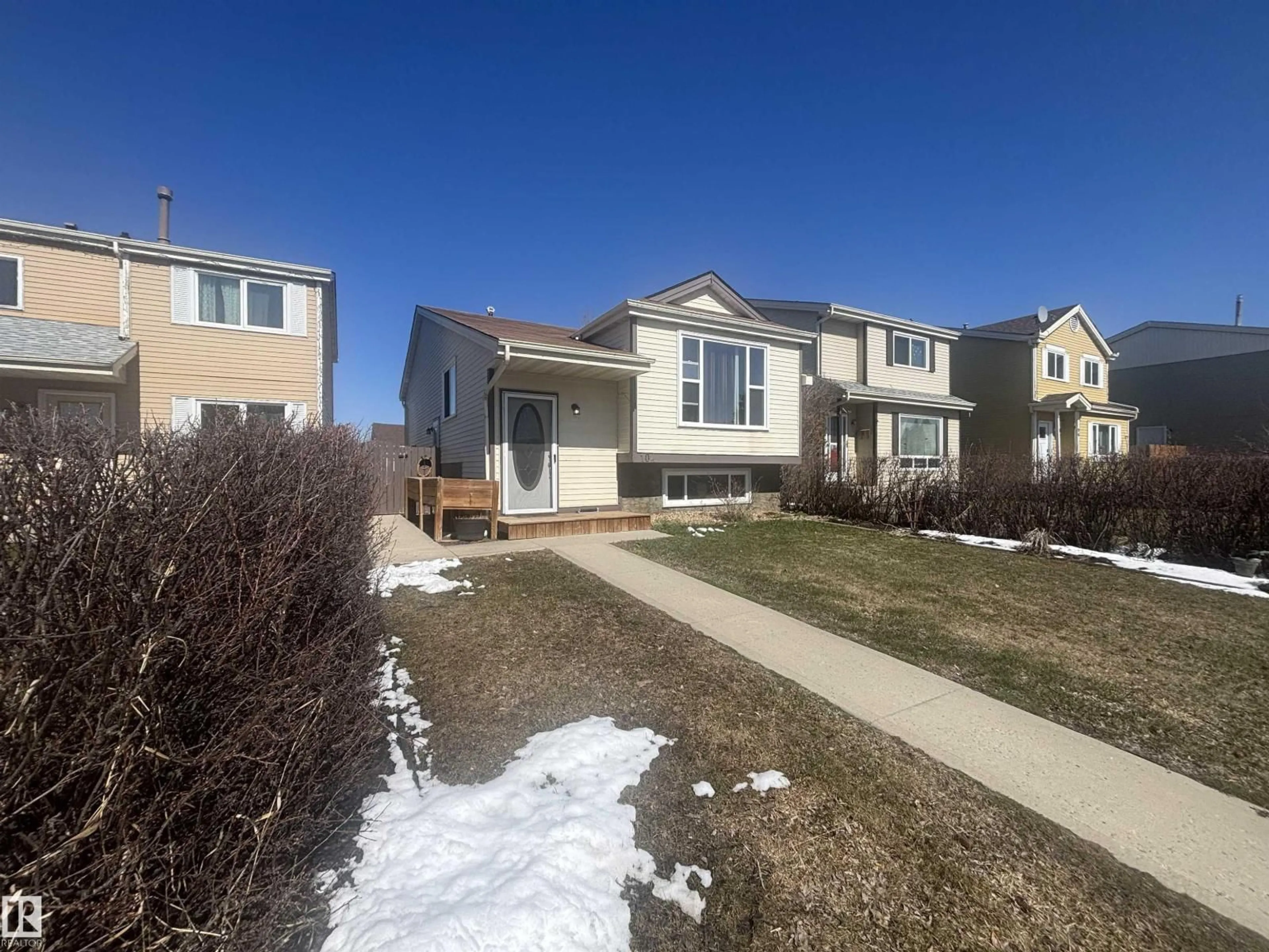 Home with vinyl exterior material, street for 104 BIRCH DR, Gibbons Alberta T0A1N0