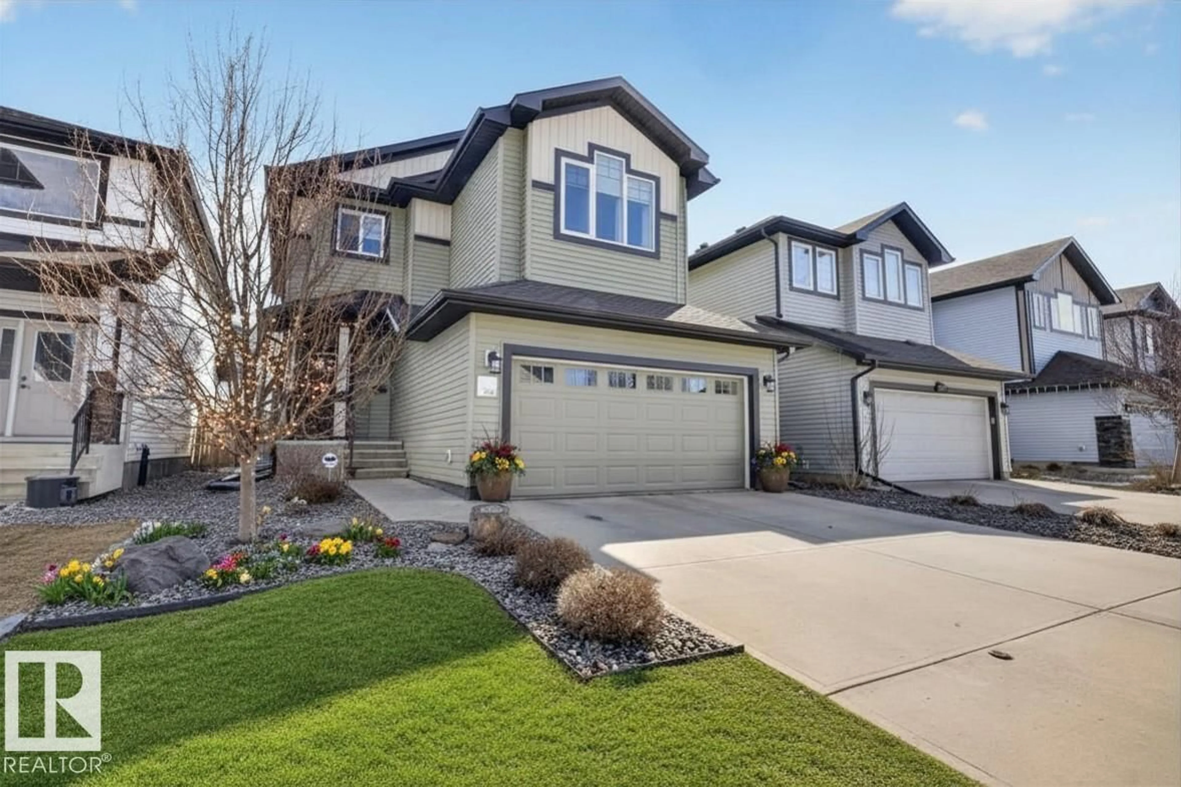 Home with vinyl exterior material, street for 17851 8 AV, Edmonton Alberta T6W2S6
