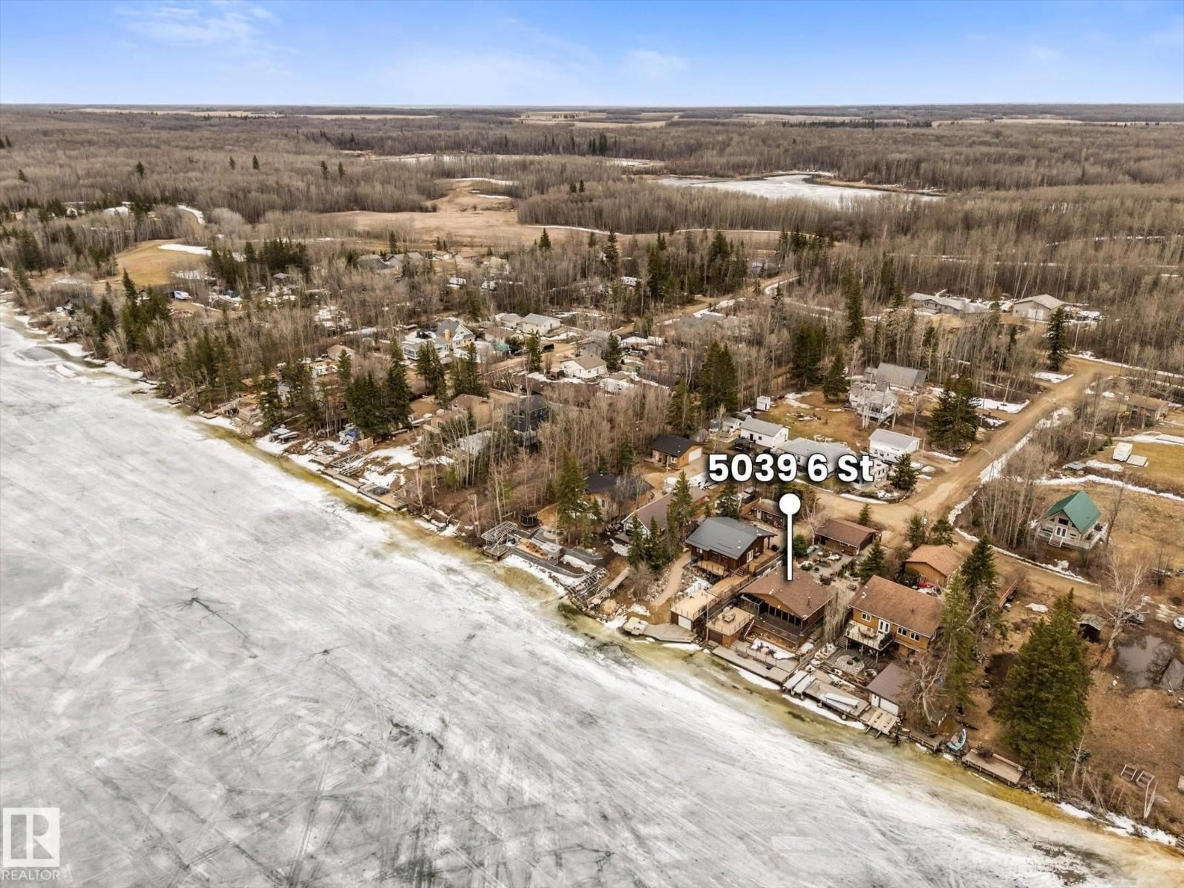A pic from outside/outdoor area/front of a property/back of a property/a pic from drone, water/lake/river/ocean view for 5039 6 ST, Rural Lac Ste. Anne County Alberta T5M2T8