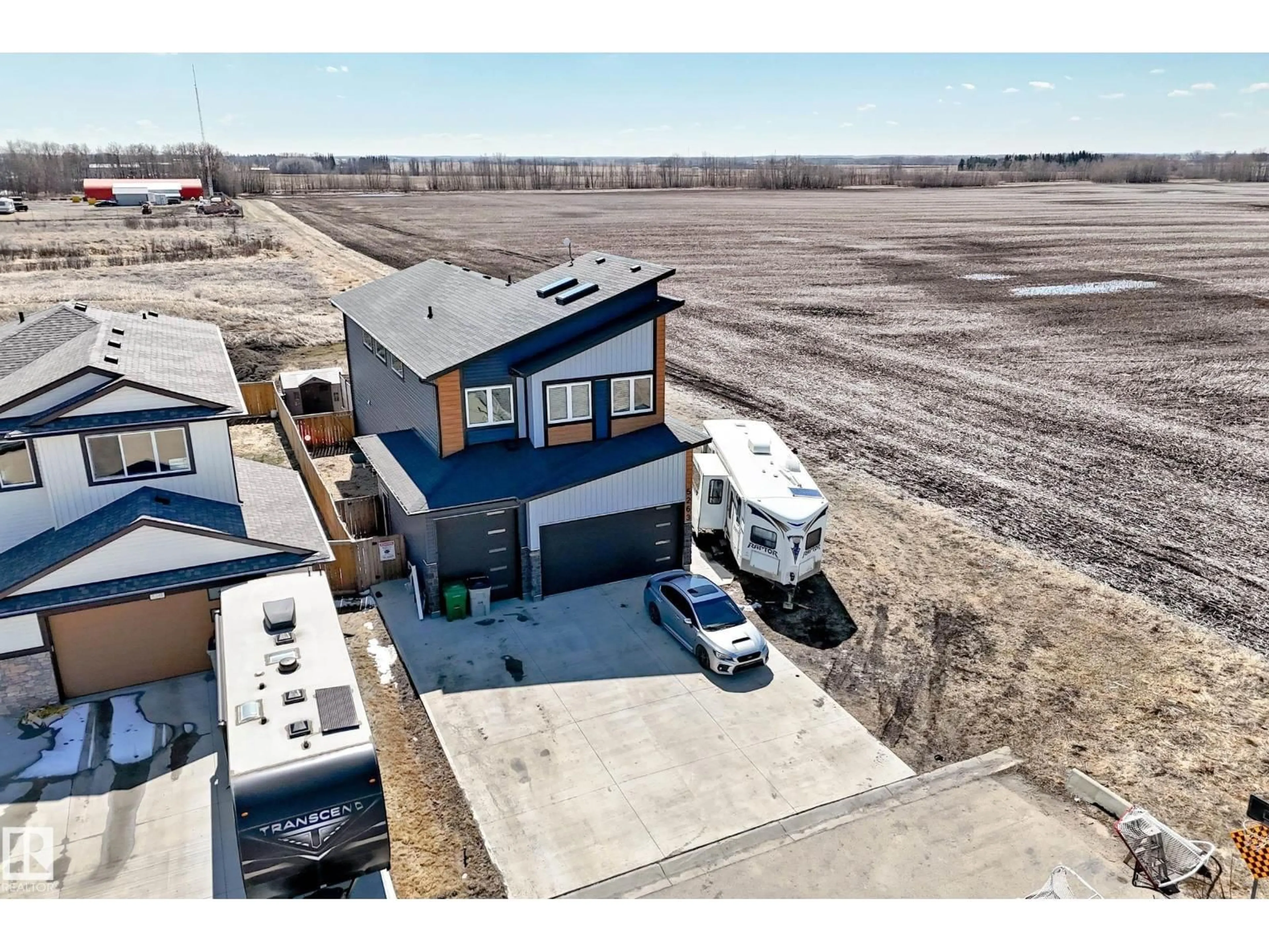 A pic from outside/outdoor area/front of a property/back of a property/a pic from drone, street for 5263 47 AVE, Calmar Alberta T0C0V0