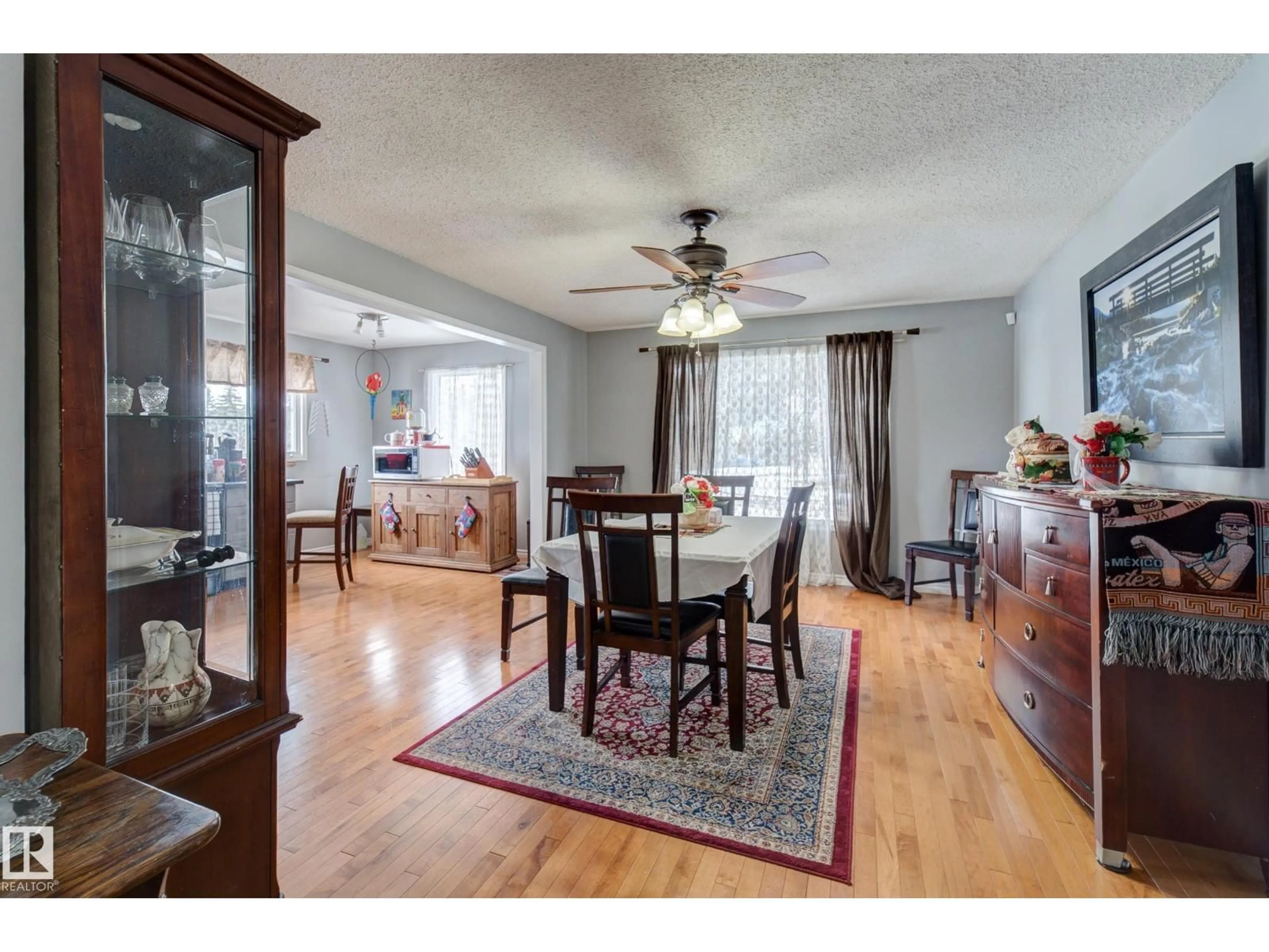 Dining room, wood/laminate floor for 4823 10 AV, Edmonton Alberta T6L4S2