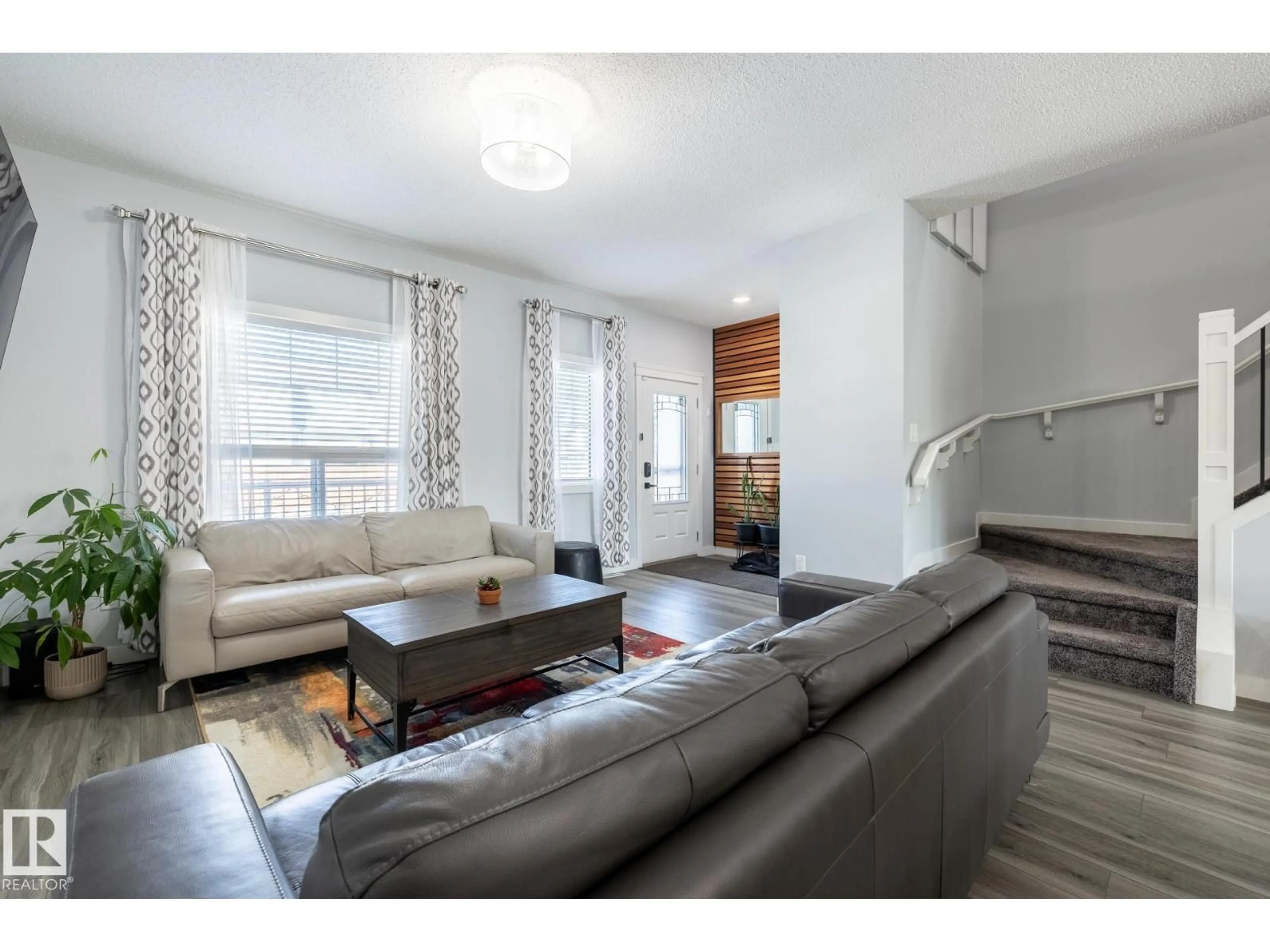 Living room with furniture, unknown for NW - 17721 64A ST, Edmonton Alberta T5Y3X4