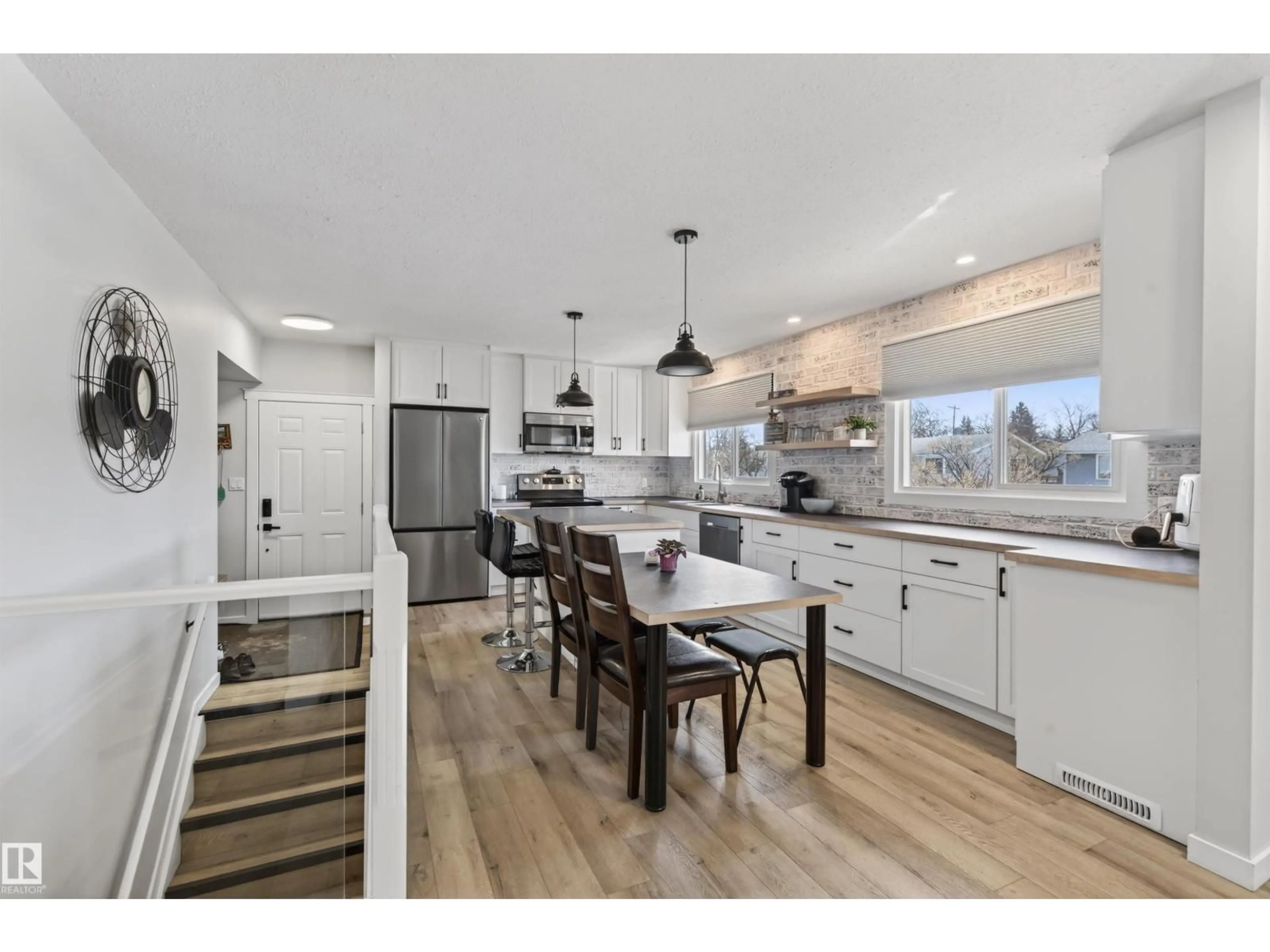 Open concept kitchen, wood/laminate floor for 5413 52 AVE, Bonnyville Town Alberta T9N0H1