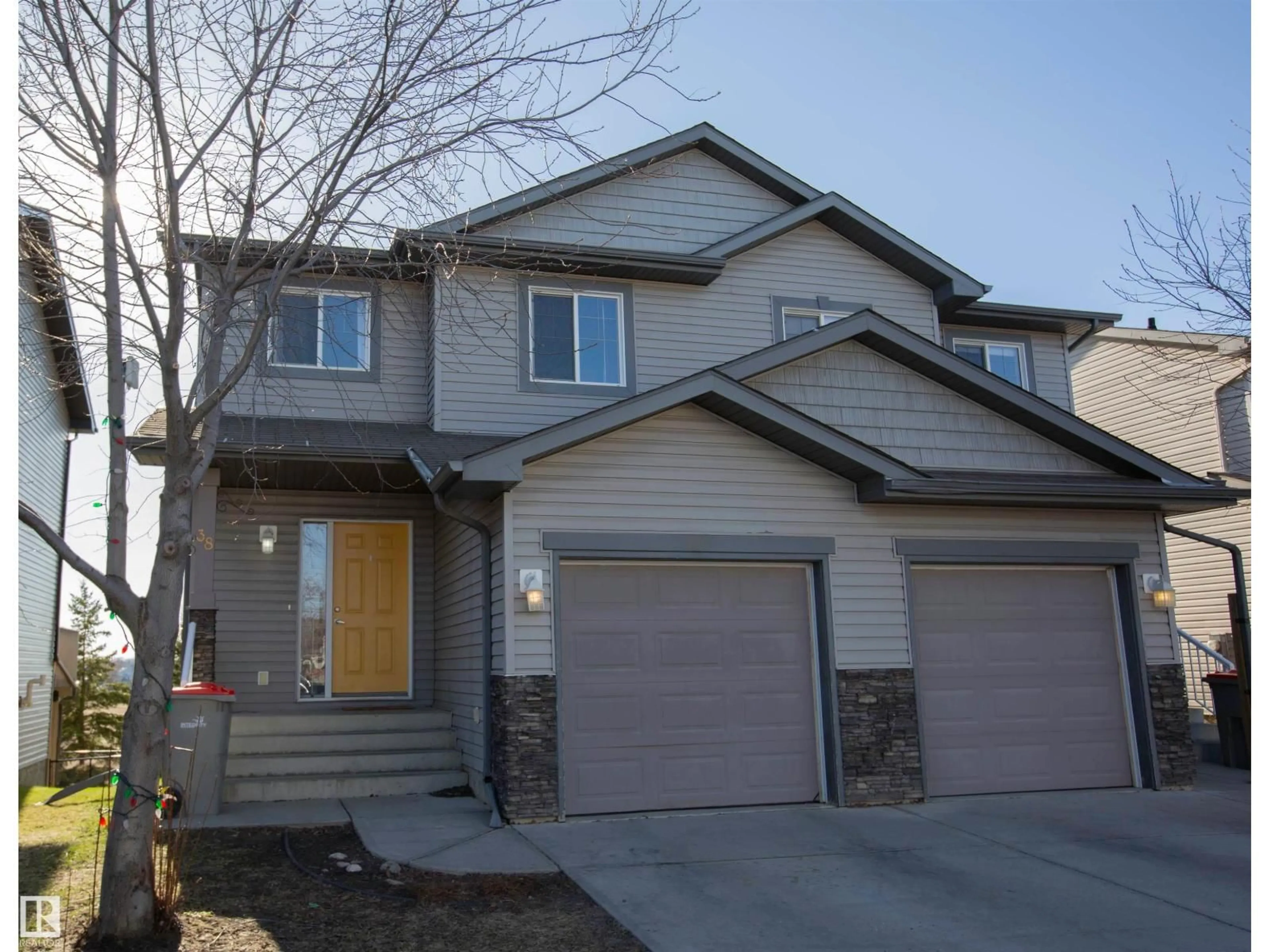 Home with vinyl exterior material, street for 38 85 SPRUCE VILLAGE DR, Spruce Grove Alberta T7X0L2