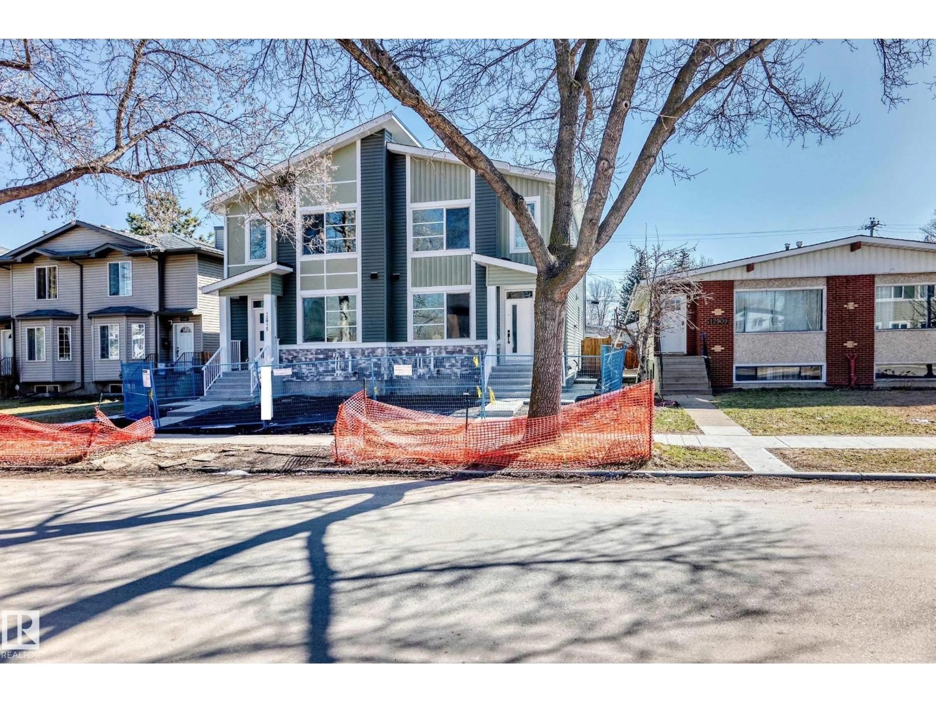 Home with vinyl exterior material, street for 12913 123 ST, Edmonton Alberta T5L0J6