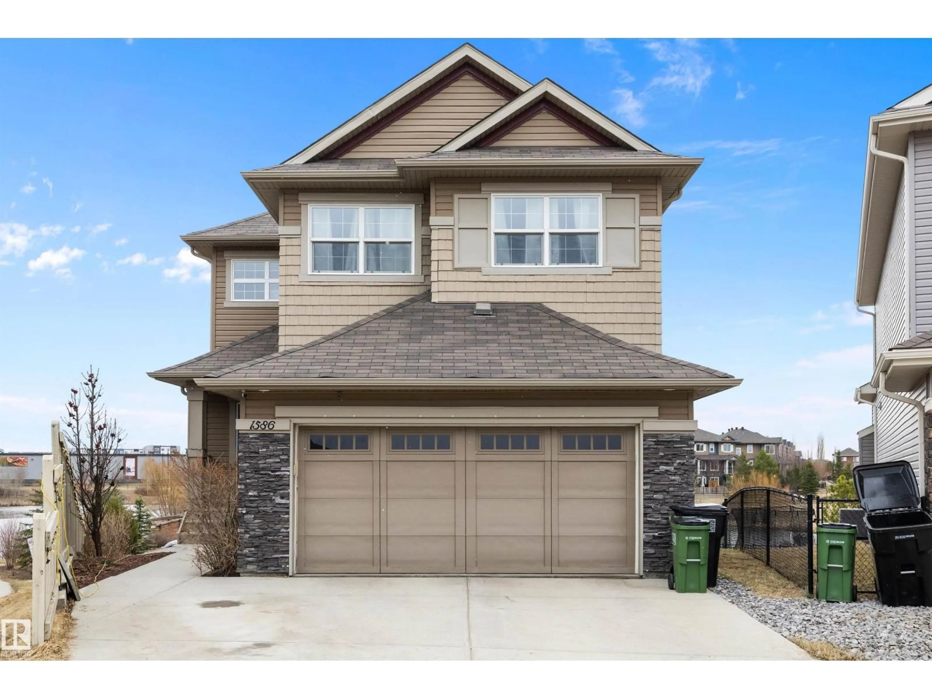 Home with vinyl exterior material, street for 1586 CHAPMAN WY, Edmonton Alberta T6W0Z2