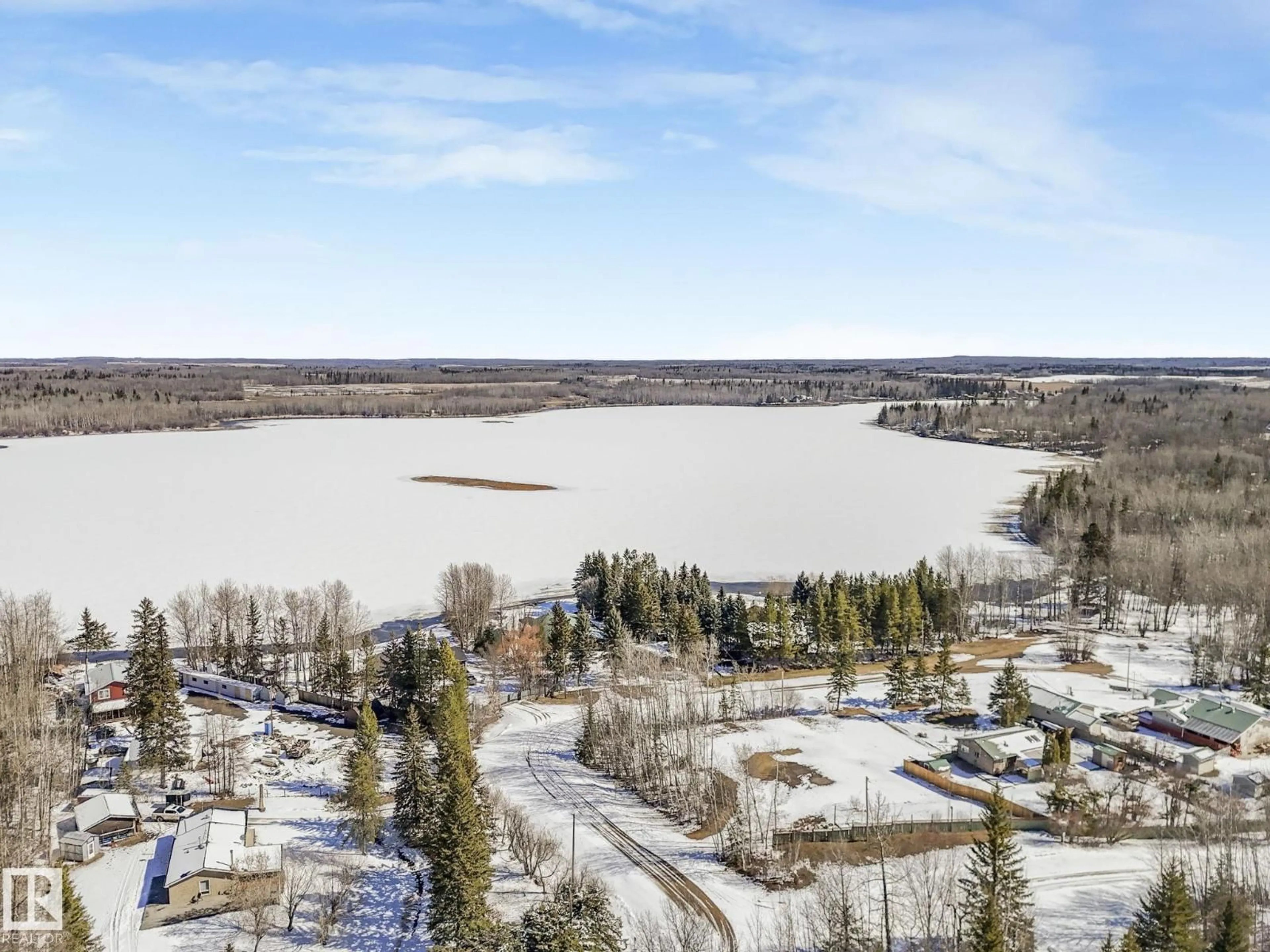 A pic from outside/outdoor area/front of a property/back of a property/a pic from drone, water/lake/river/ocean view for 17 - 2120 TWP ROAD 565, Rural Lac Ste. Anne County Alberta T0E1V0