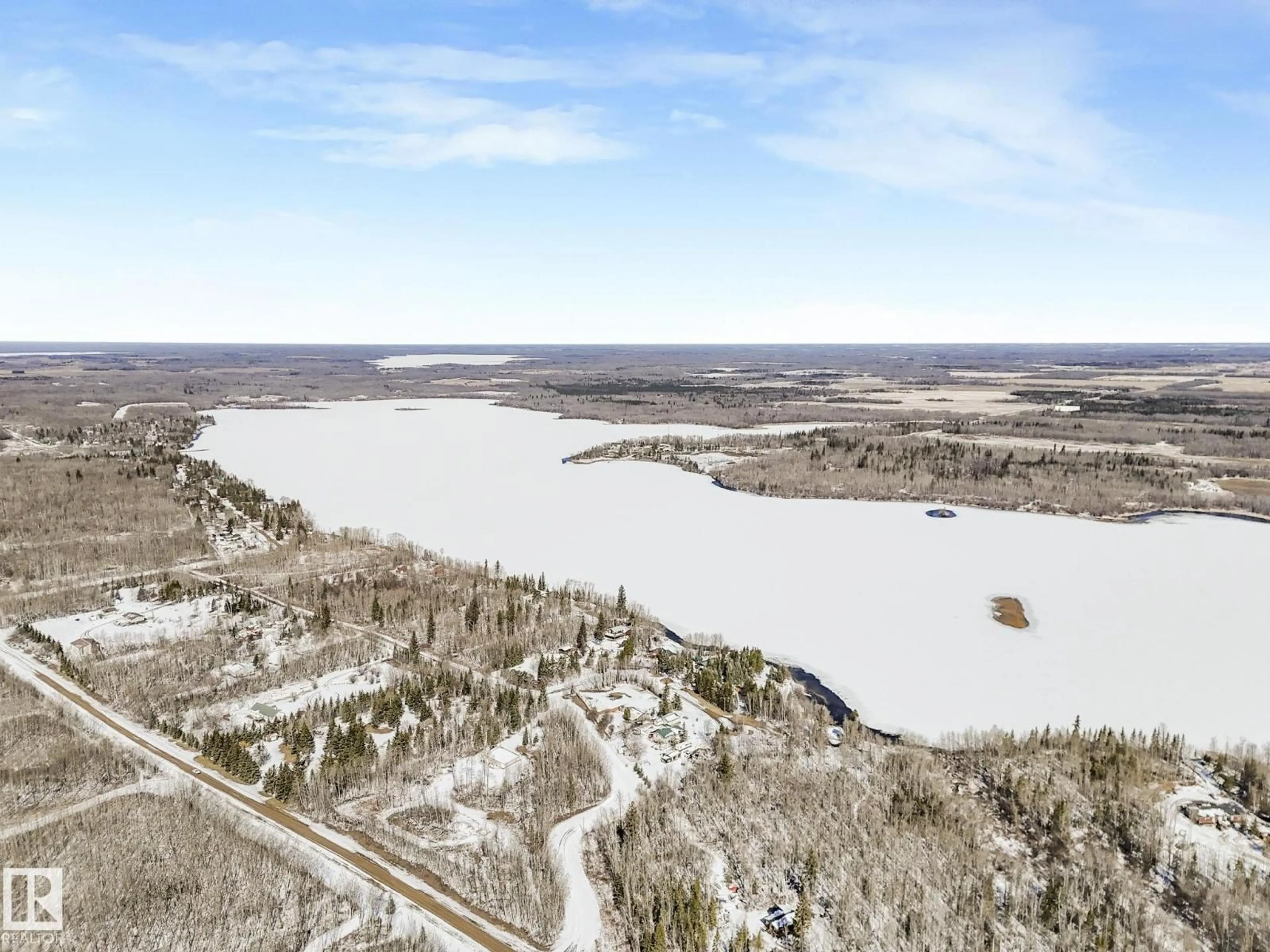 A pic from outside/outdoor area/front of a property/back of a property/a pic from drone, water/lake/river/ocean view for 17 - 2120 TWP ROAD 565, Rural Lac Ste. Anne County Alberta T0E1V0