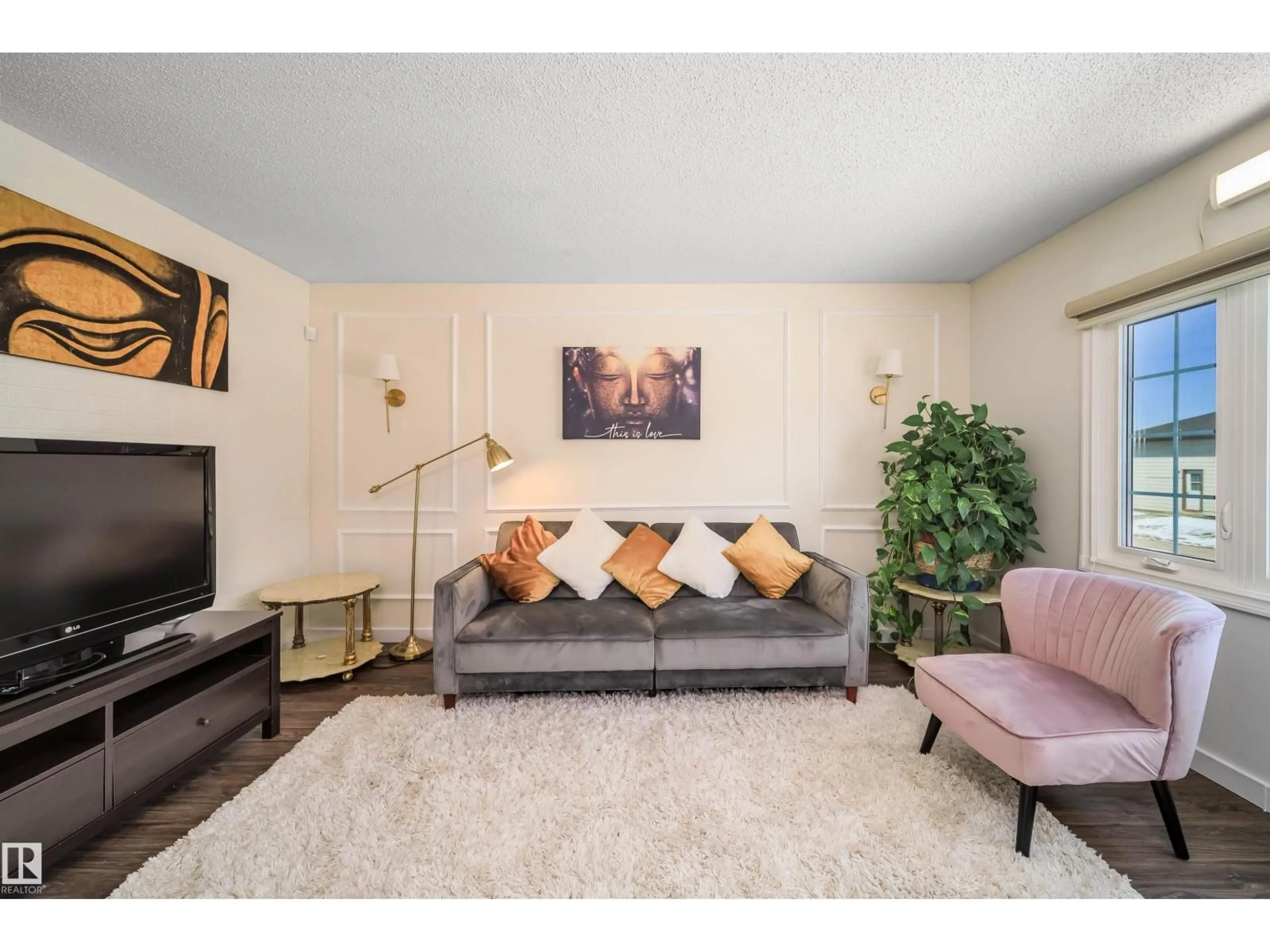 Living room with furniture, unknown for 5303 21 AV, Edmonton Alberta T6L5G5