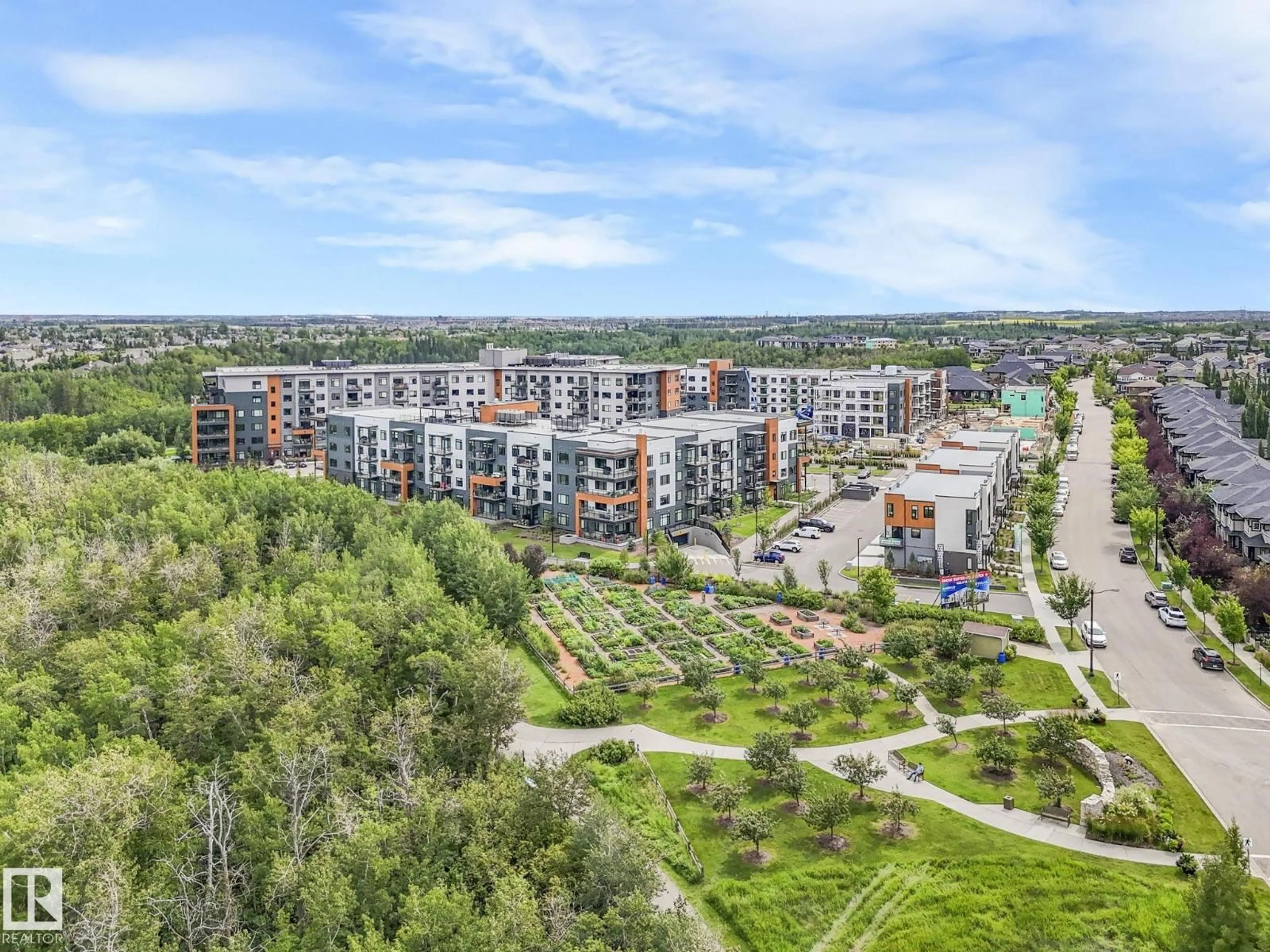 A pic from outside/outdoor area/front of a property/back of a property/a pic from drone, city buildings view from balcony for #101 - 7471 MAY CM, Edmonton Alberta T6R0X5