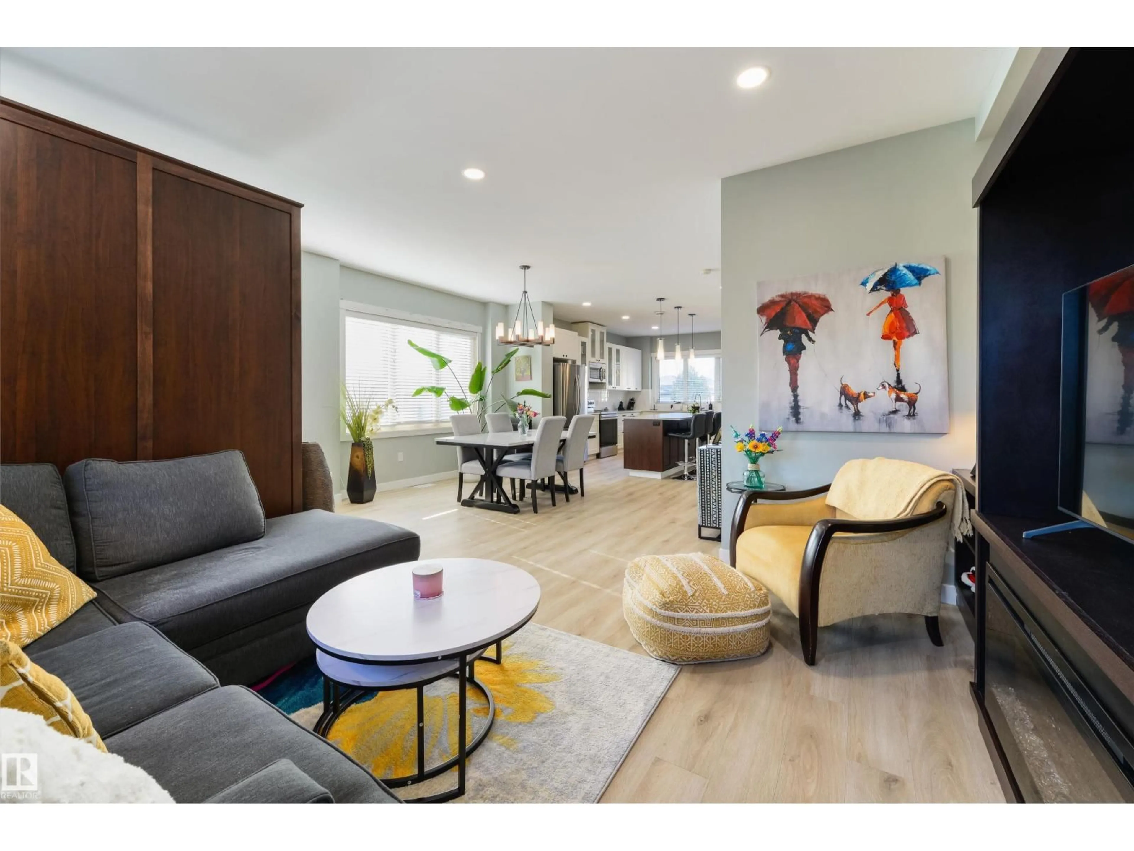 Living room with furniture, unknown for 14419 104 AV, Edmonton Alberta T5N2X8