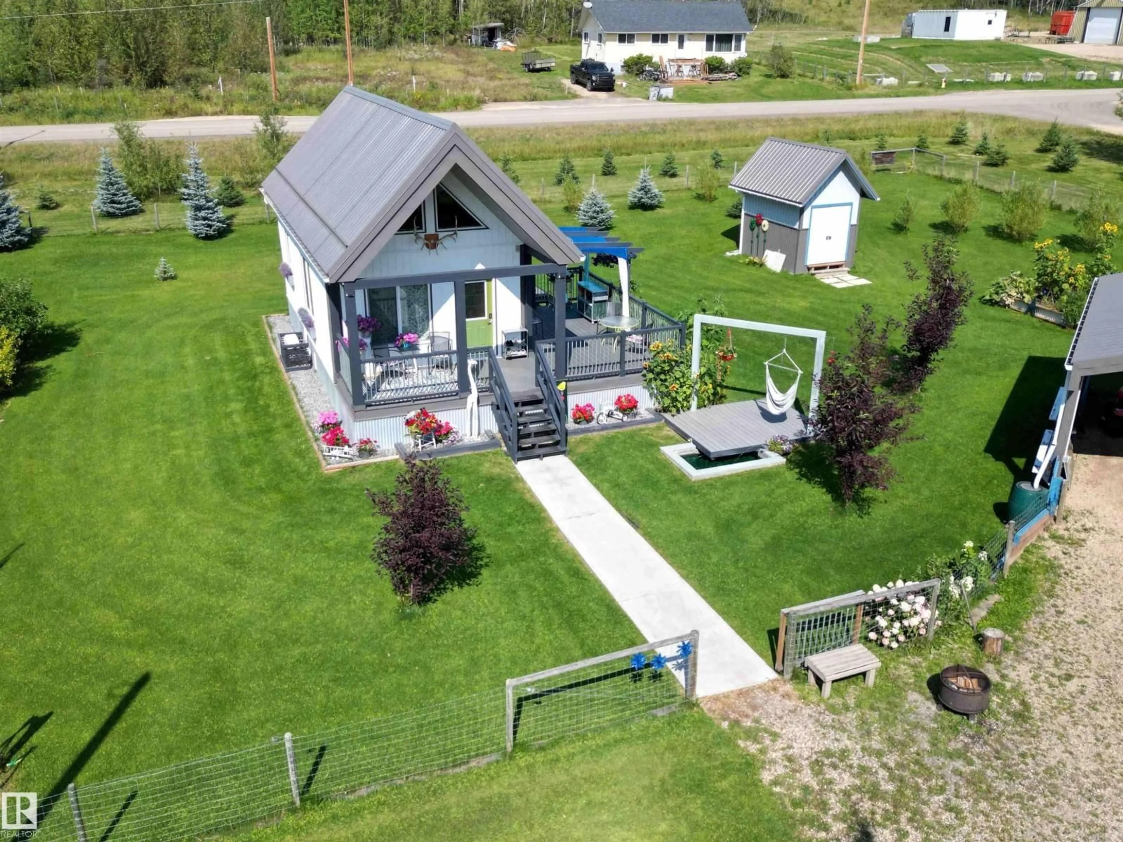 A pic from outside/outdoor area/front of a property/back of a property/a pic from drone, mountain view for 410 5 ST, Winfield Alberta T0C2X0