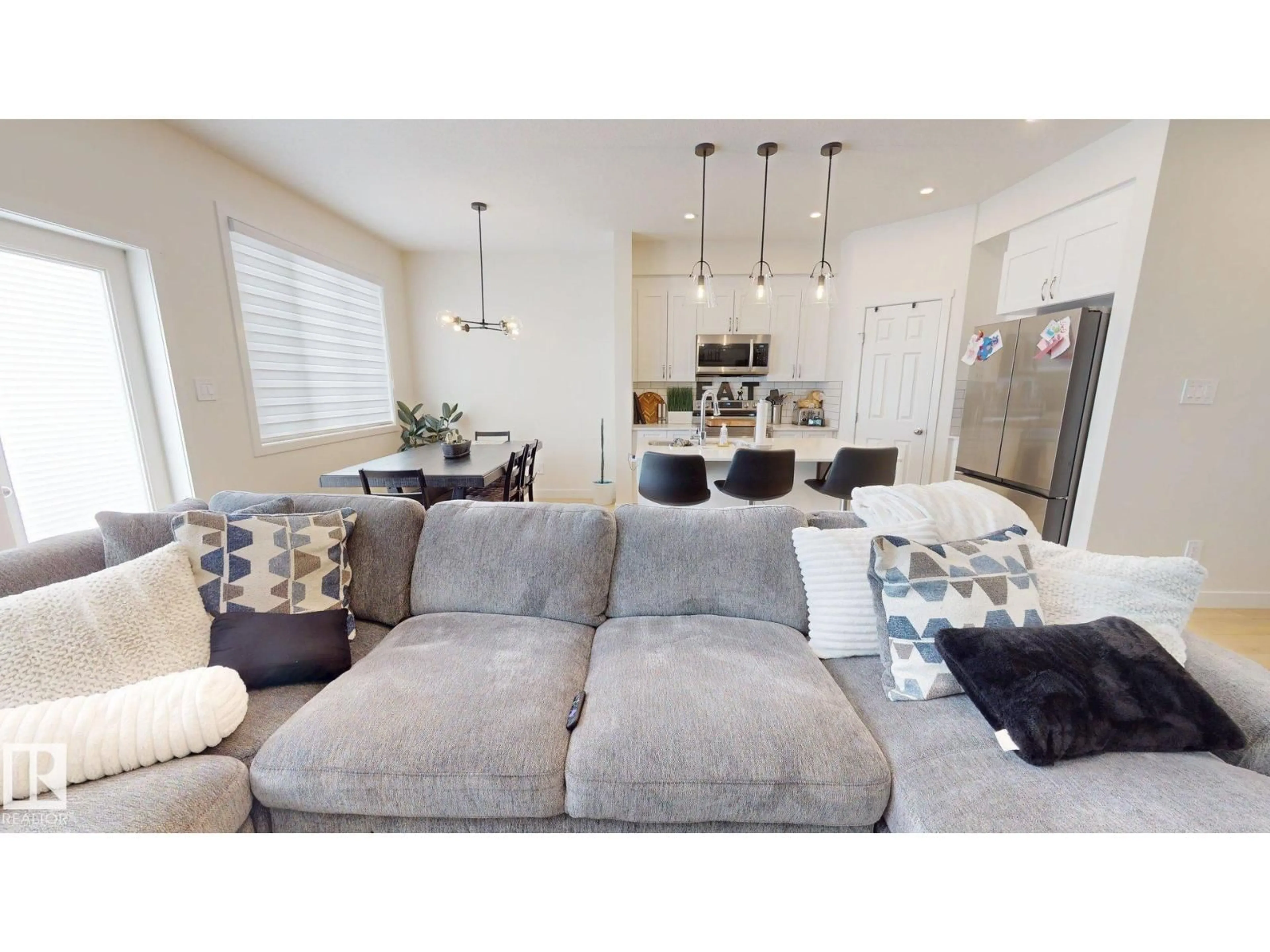 Living room with furniture, unknown for 8723 183 AV, Edmonton Alberta T5Z0G6