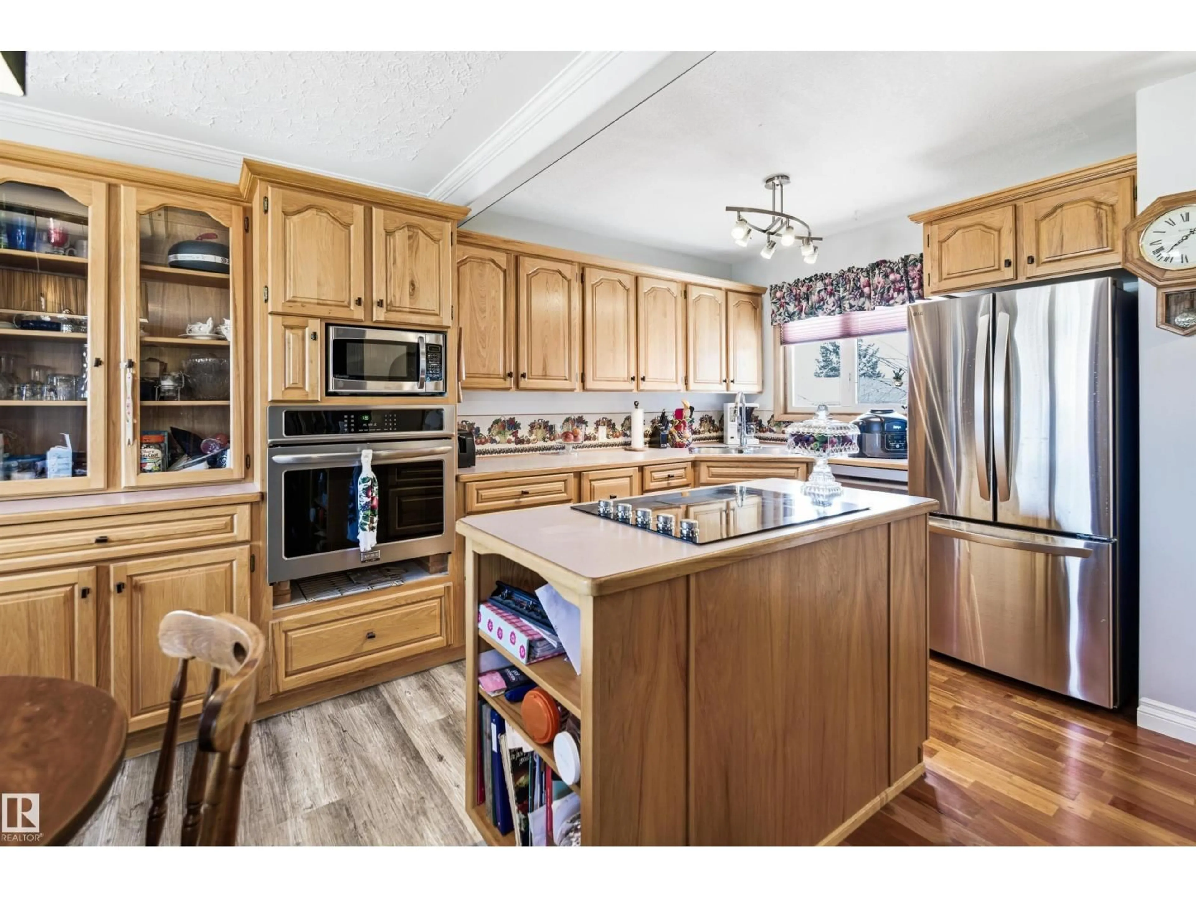 Open concept kitchen, wood/laminate floor for 3920 35A AV, Red Deer Alberta T4N2S5