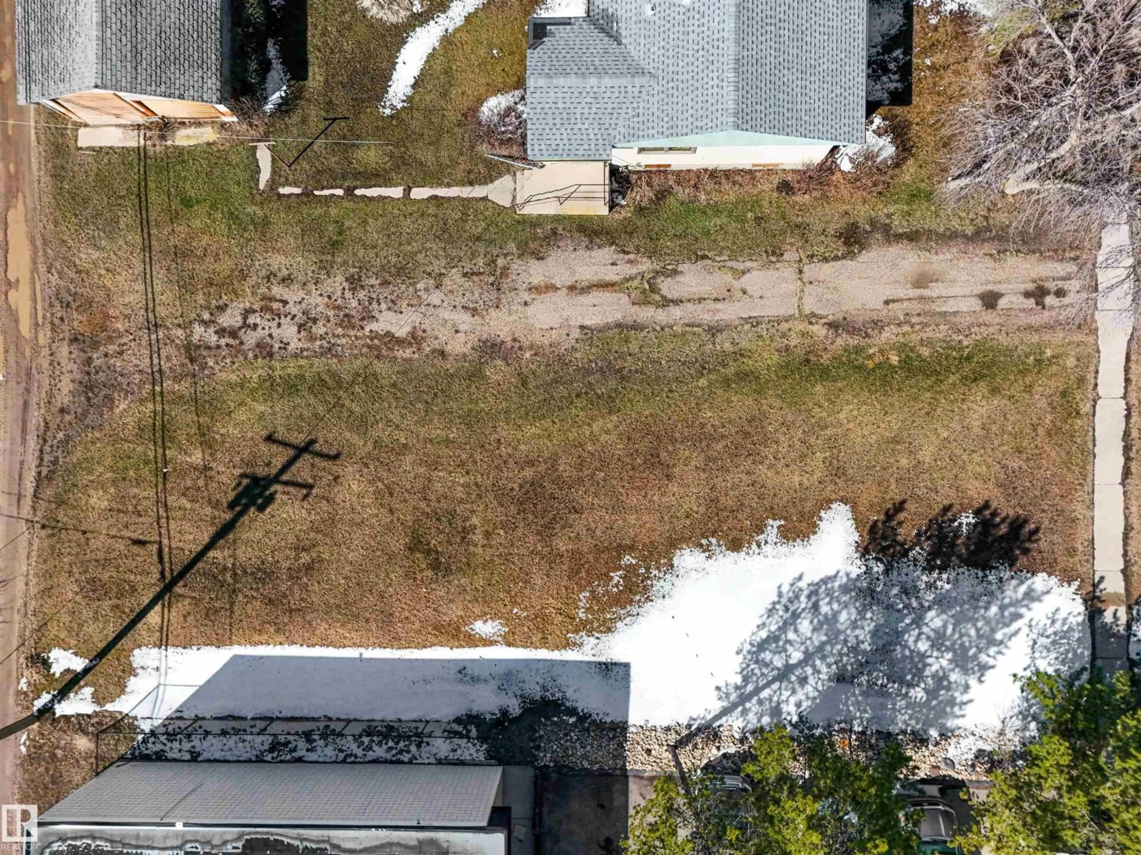 A pic from outside/outdoor area/front of a property/back of a property/a pic from drone, street for 5124 53 ST, Drayton Valley Alberta T7A1R1