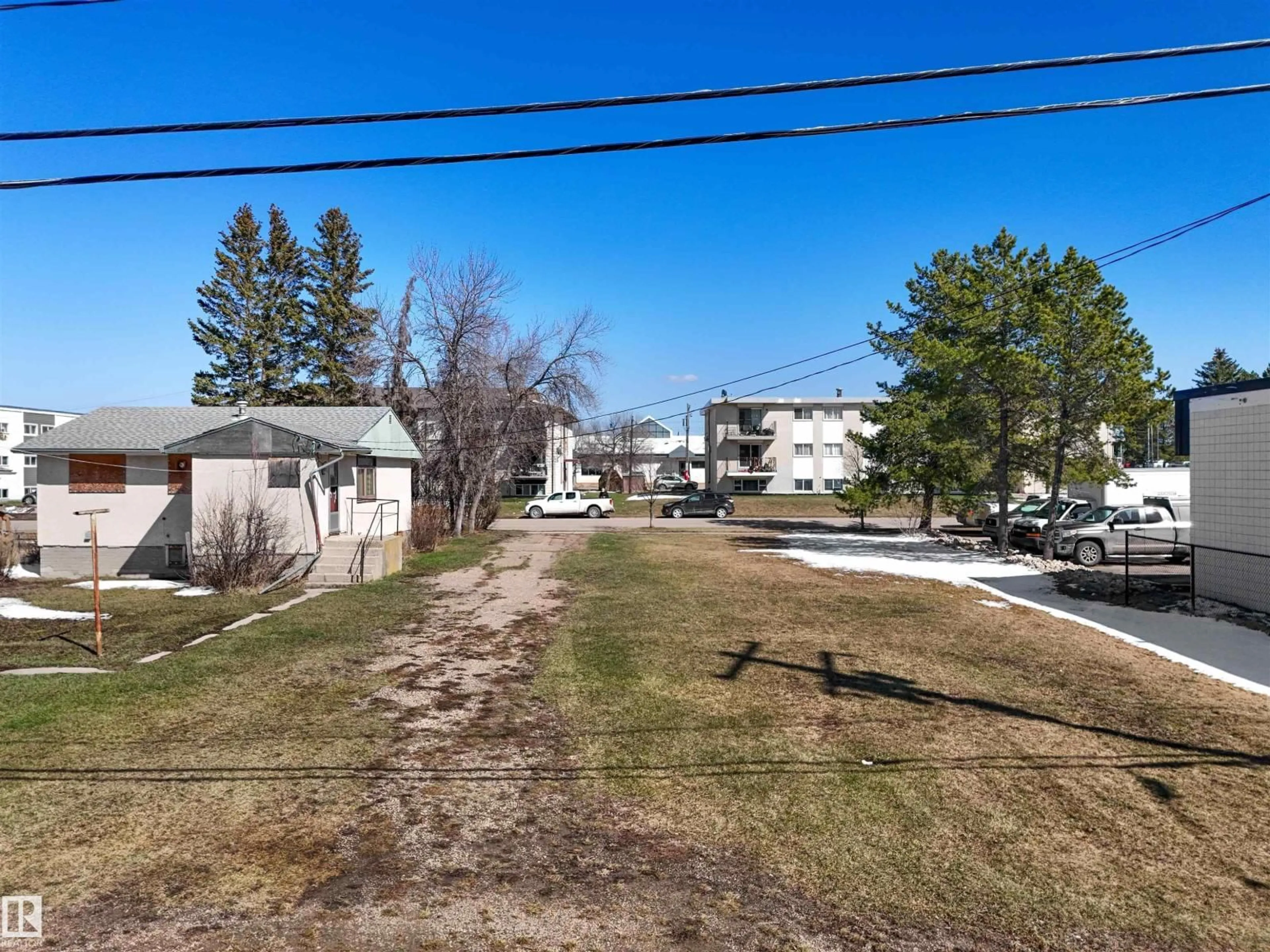 A pic from outside/outdoor area/front of a property/back of a property/a pic from drone, street for 5124 53 ST, Drayton Valley Alberta T7A1R1