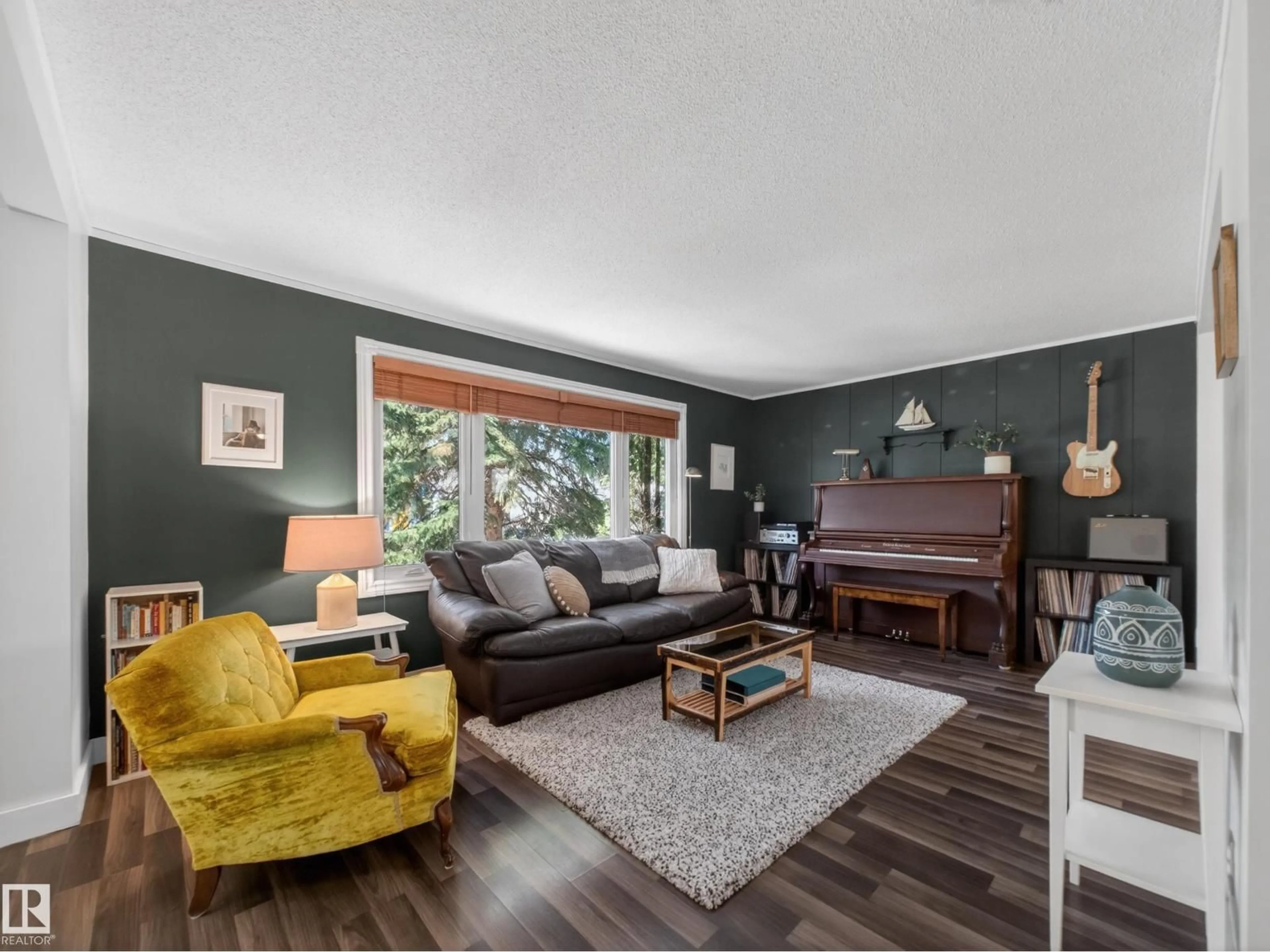 Living room with furniture, wood/laminate floor for NW - 11345 89 ST, Edmonton Alberta T5B3T5