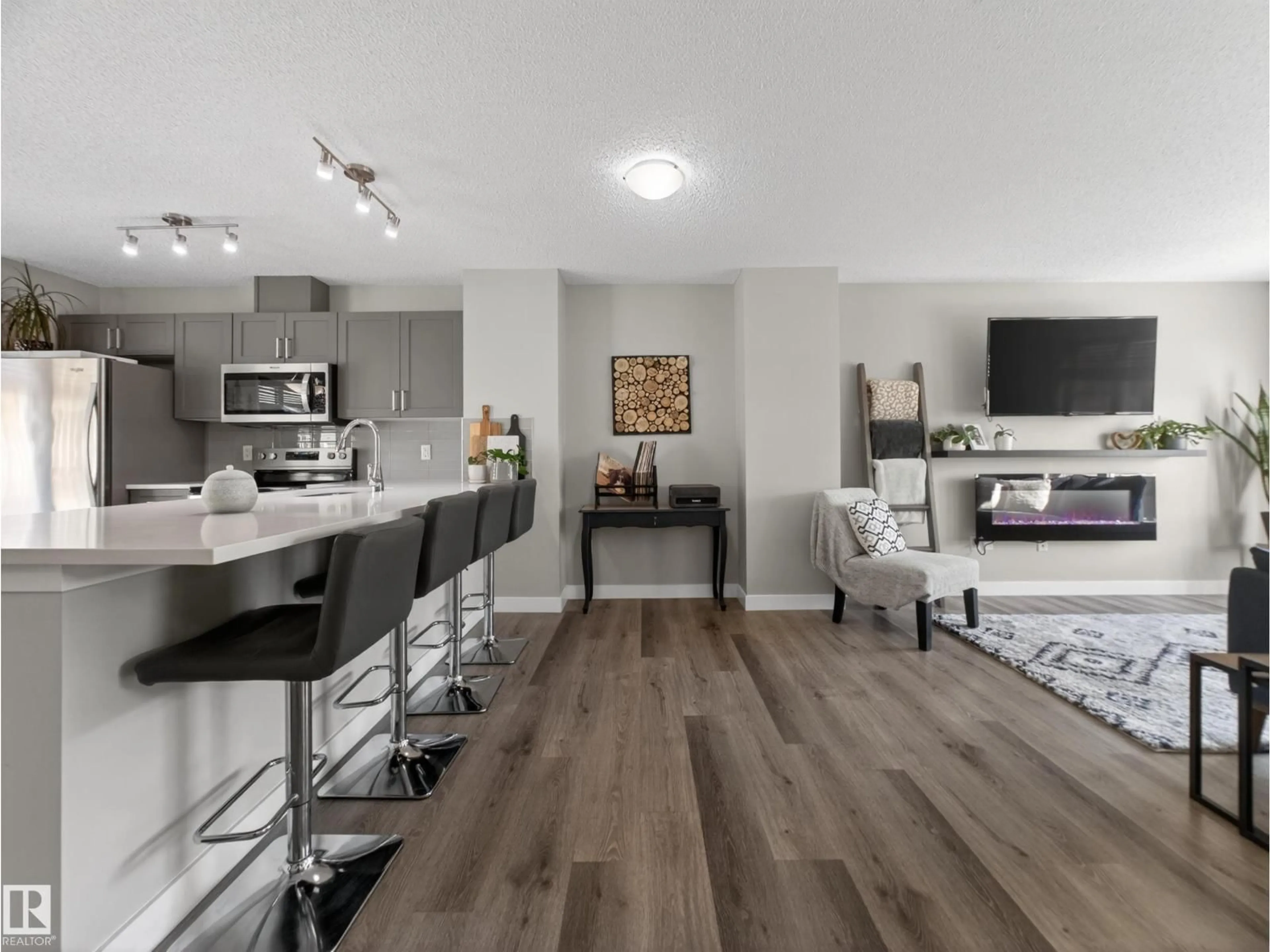 Open concept kitchen, wood/laminate floor for 24 - 4470 PROWSE RD, Edmonton Alberta T6W3R5