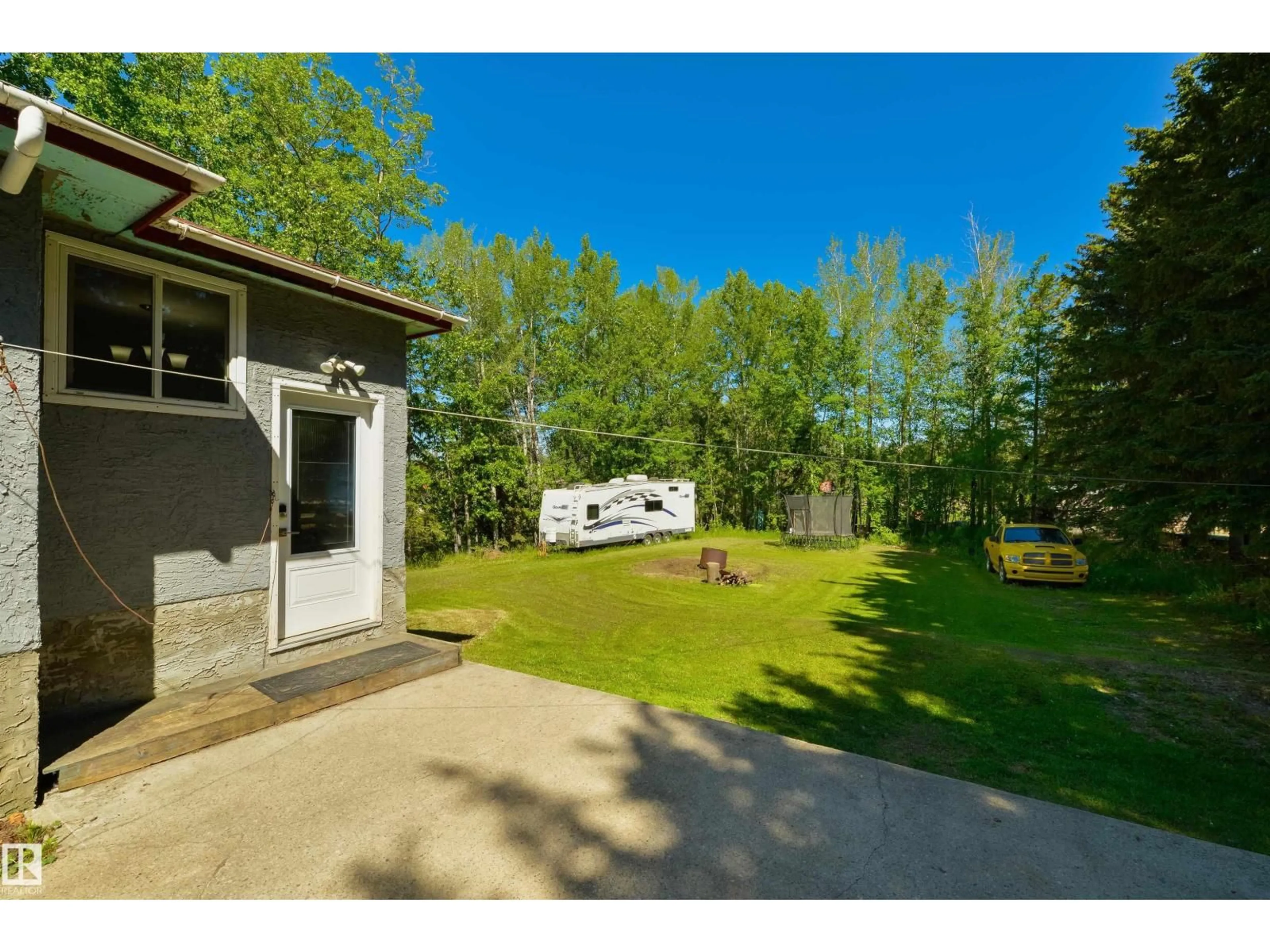 A pic from outside/outdoor area/front of a property/back of a property/a pic from drone, unknown for 6130 HGHWAY 16, Rural Parkland County Alberta T0E0W0