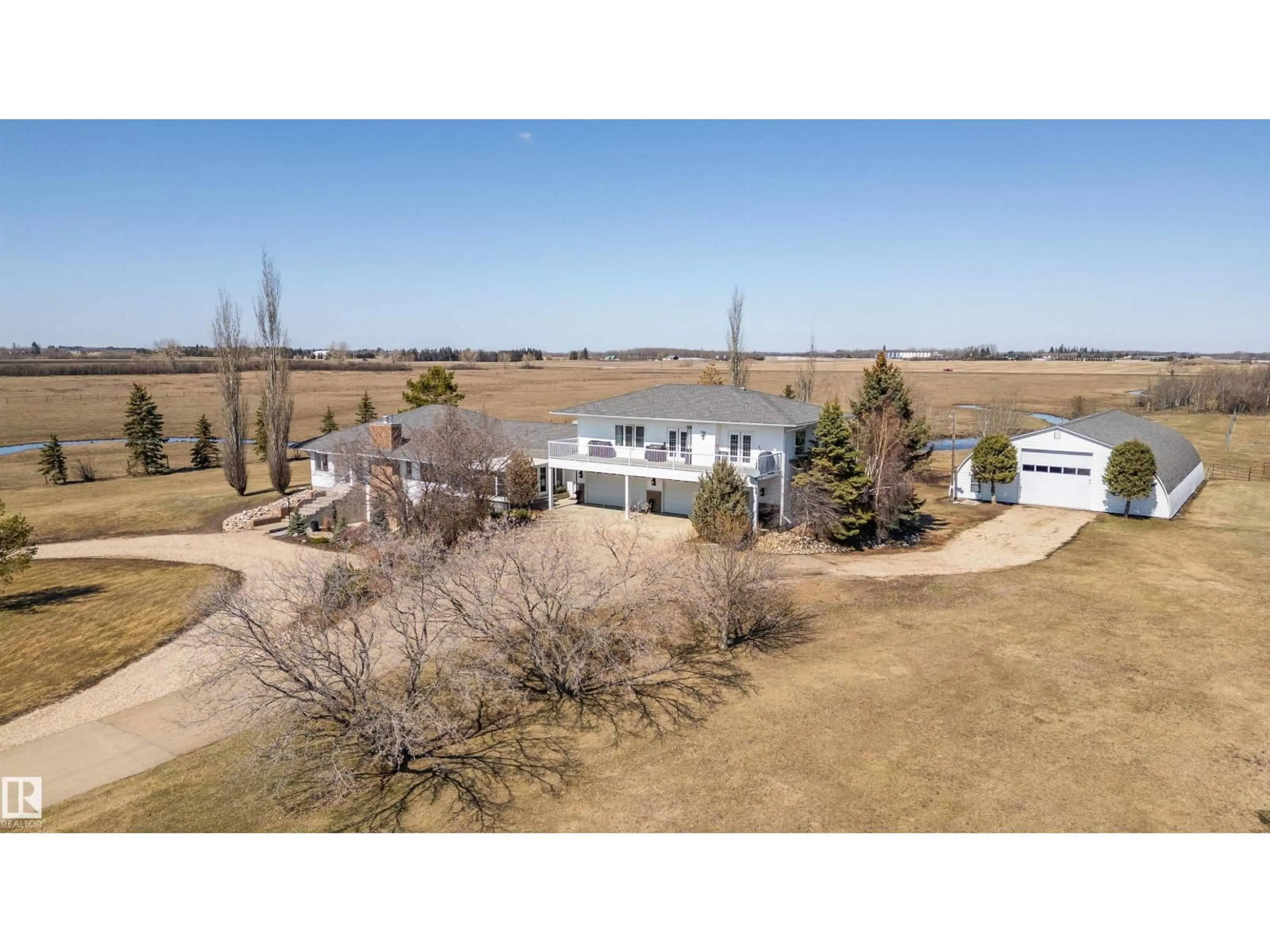 A pic from outside/outdoor area/front of a property/back of a property/a pic from drone, water/lake/river/ocean view for 54522 RGE ROAD 255, Rural Sturgeon County Alberta T8T0V1