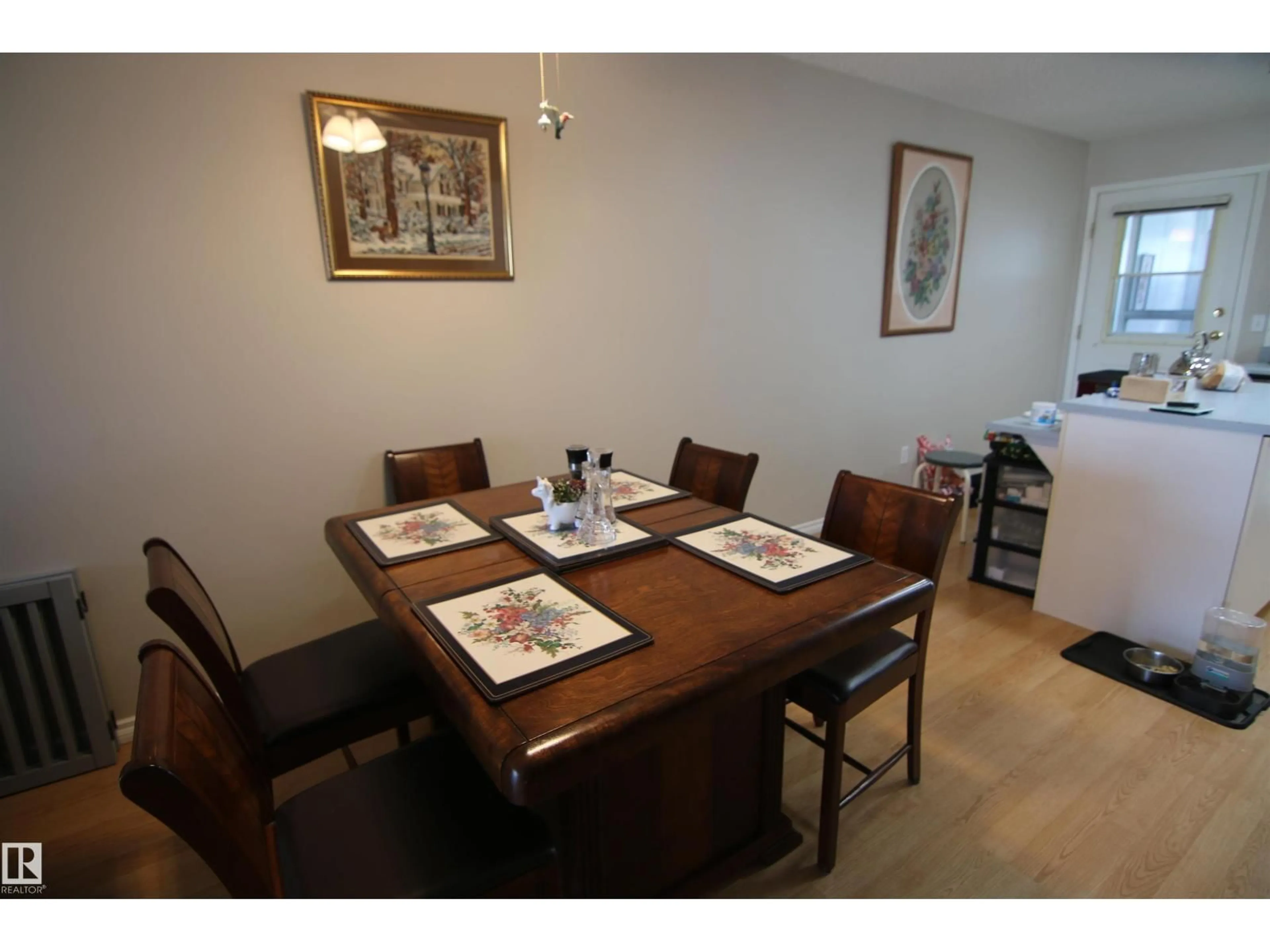 Dining room, wood/laminate floor for 1 CENTURY VILLAS CL, Fort Saskatchewan Alberta T8L4G1